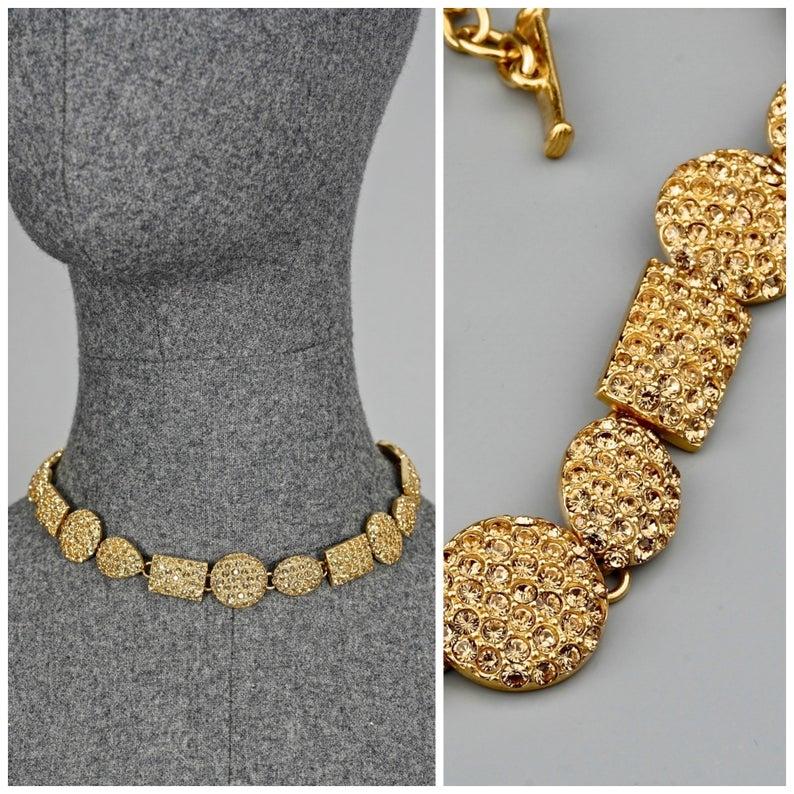 Vintage YVES SAINT LAURENT Ysl Geometric Rhinestone Link Choker Necklace

Measurements:
Height:0.79 inch (2 cm)
Wearable Length: 15.35 inches to 17.32 inches (39 cm to 44 cm)

Features:
- 100% Authentic YVES SAINT LAURENT.
- Geometric links studded