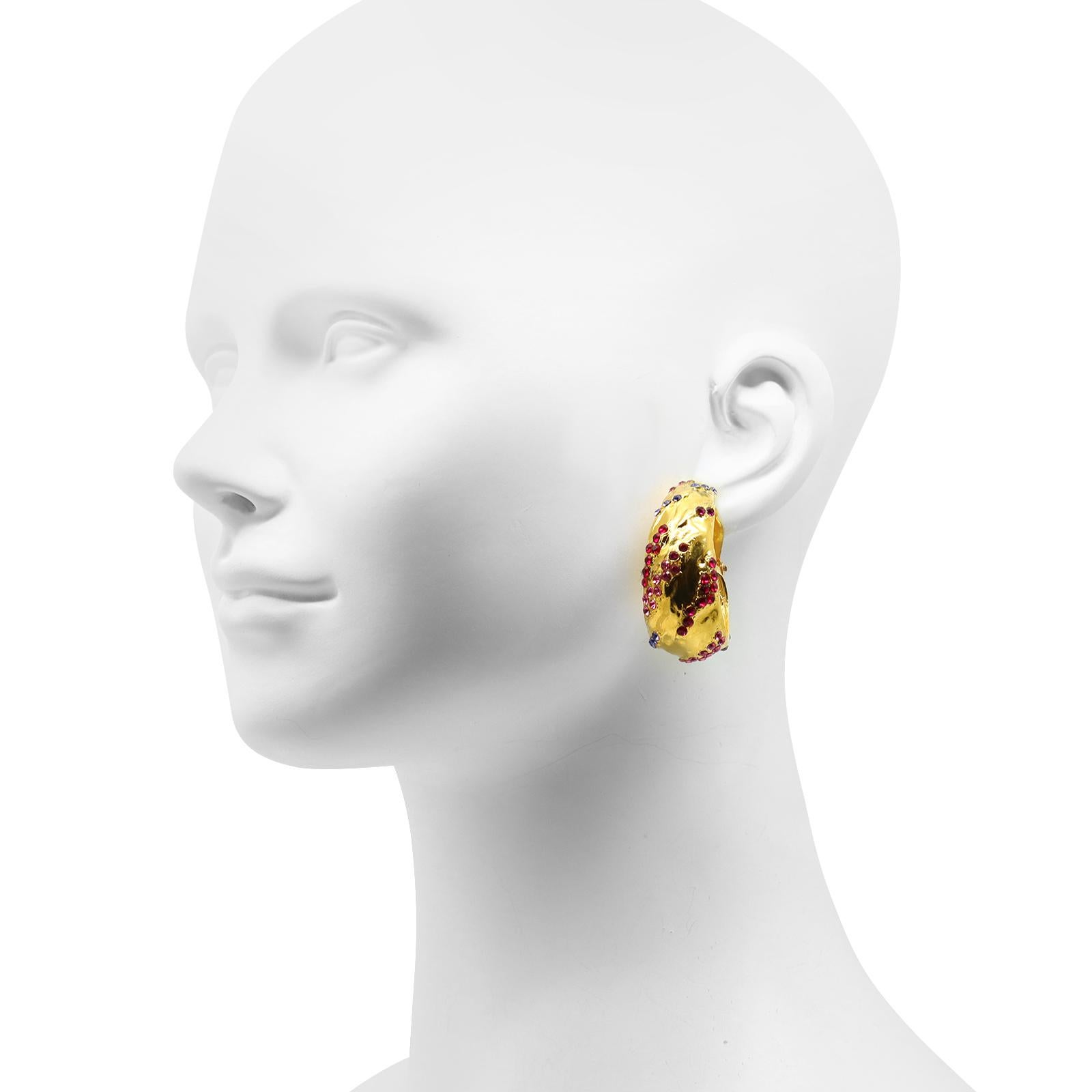 Vintage Yves Saint Laurent YSL Gold Hoop Earrings.  The hoops are wide and clip-on.   Spectacular and very YSL.  Again, the photos don't do these justice like trying them on would.  These are just out of this world.
Acquired in Paris, but of
