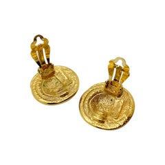 Pendientes vintage de Yves Saint Laurent (YSL) con diseño floral tipo «nido», chapados en oro, de los años 80