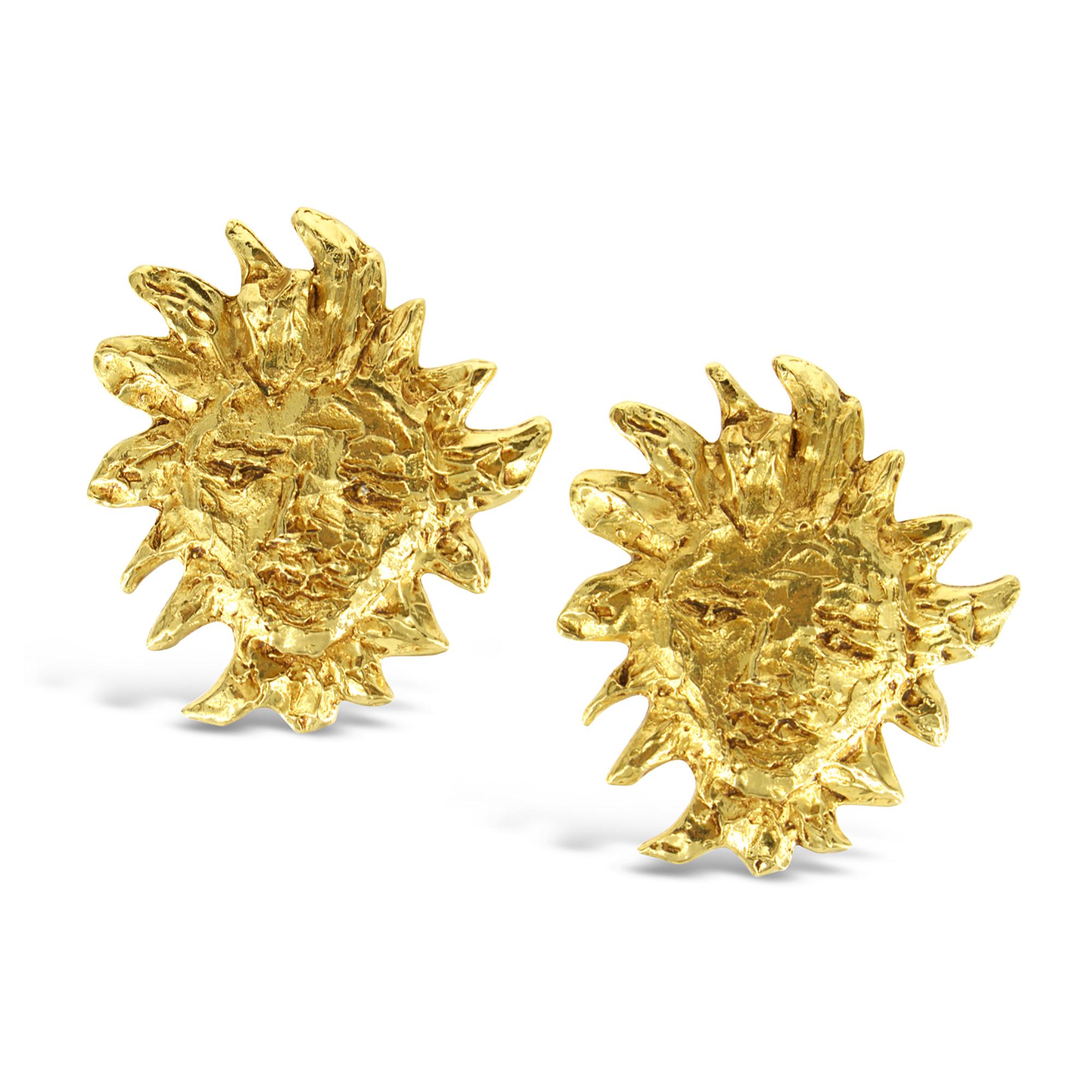 Vintage Yves Saint Laurent YSL Gold Sun Earrings.  These are iconic and classic earrings.  When you wear them, you make a style statement that is chic and classic.    Clip On

These will always make a statement, no matter what you're wearing!