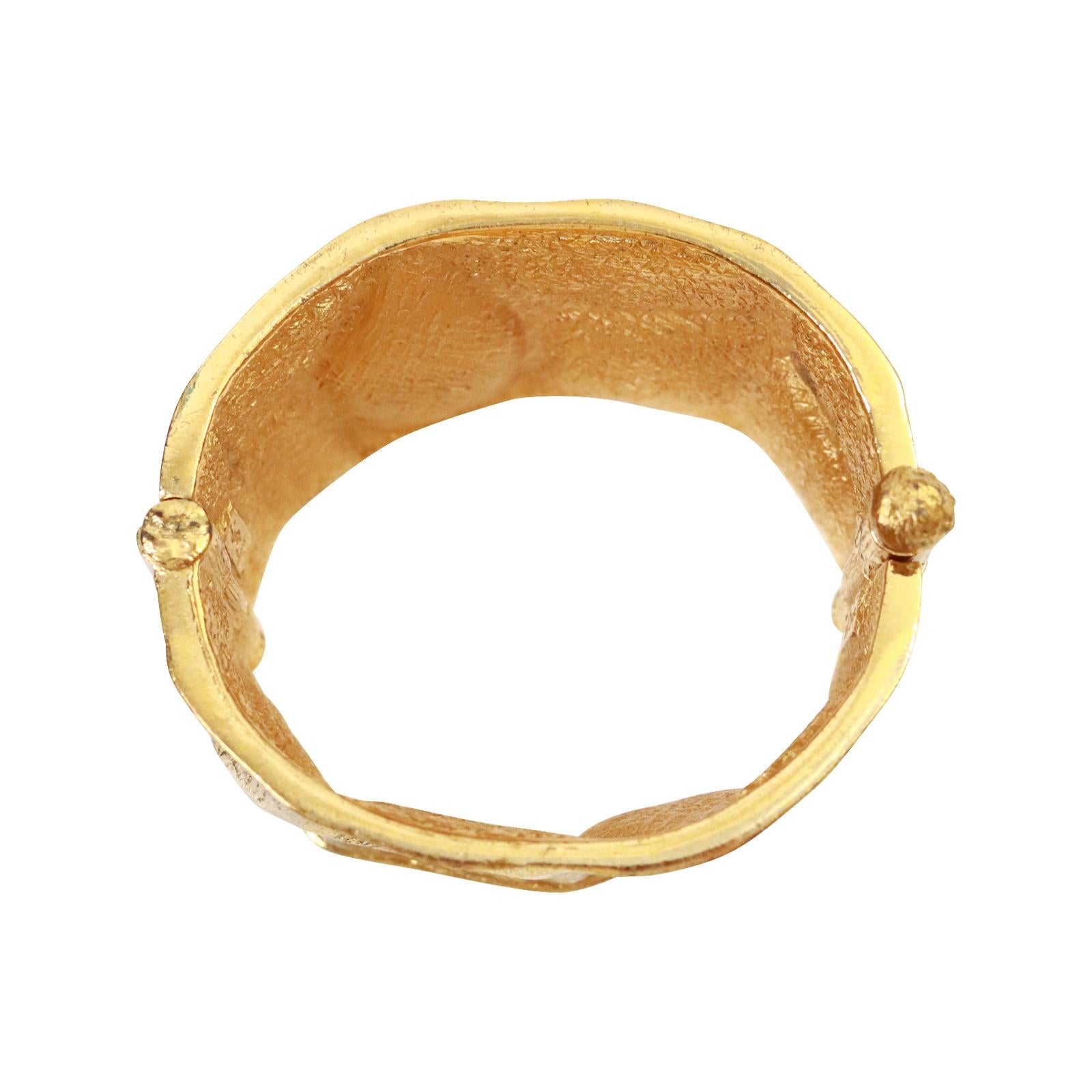 Vintage Yves Saint Laurent YSL Gold Tone Cuff Bracelet Circa 1990s In Good Condition For Sale In New York, NY