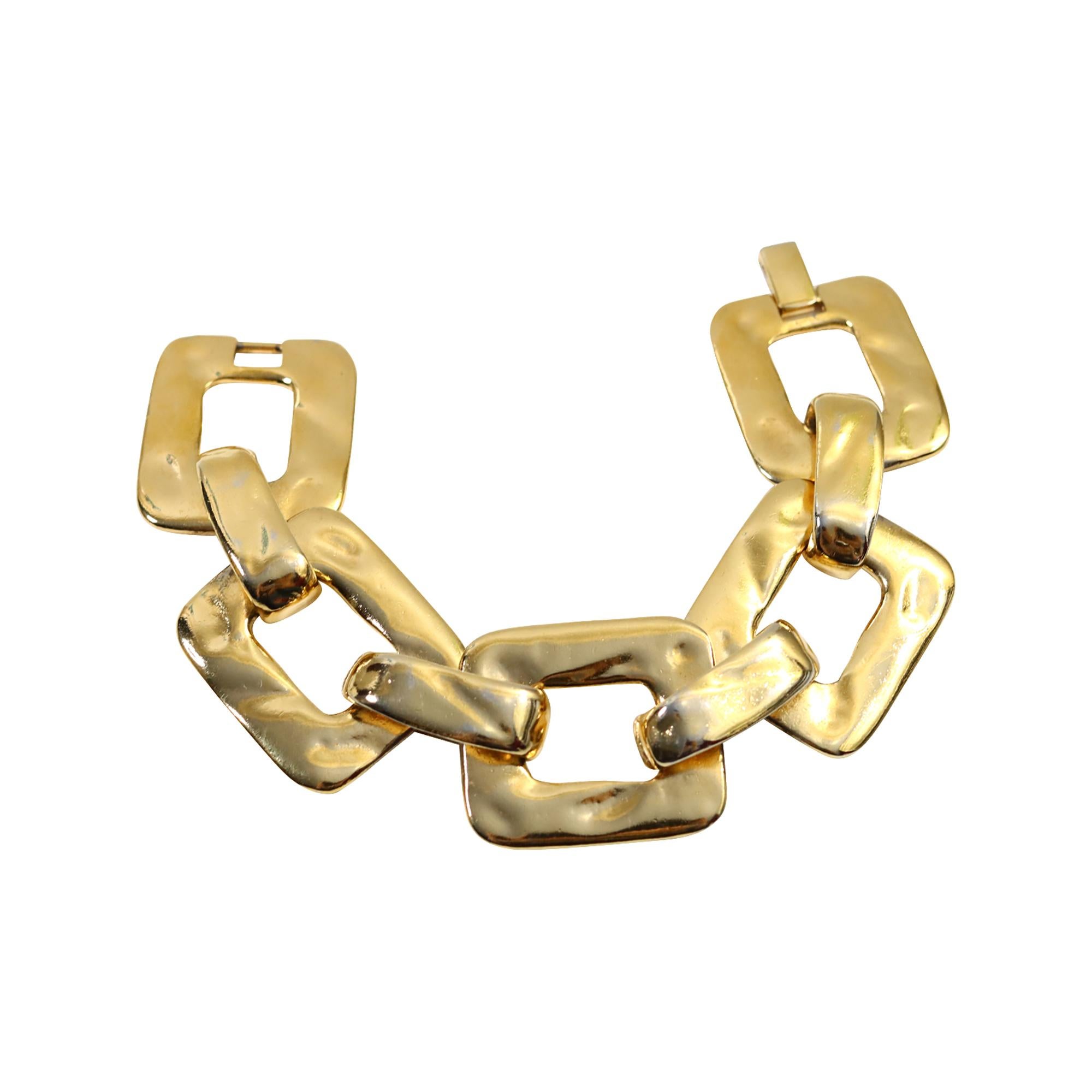 Vintage Yves Saint Laurent YSL Gold Tone Heavy Link Armband CIRCA 1985.  Es wurde auf der Couture-Show im Januar 1985 gezeigt.  Signiert und nummeriert #267 von #425. Besonders, wenn es läuft.  Ich habe das selbst eingestellt.  Im Laufe der Jahre
