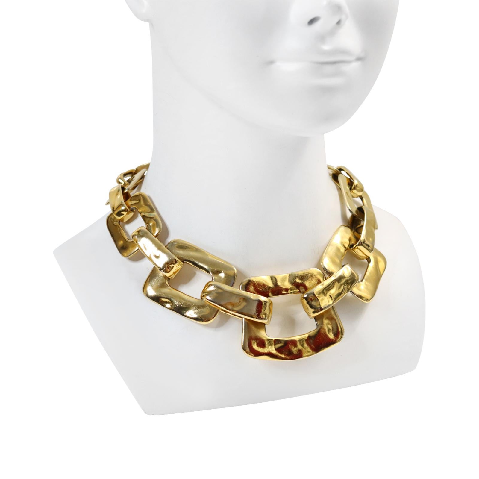 Vintage YSL Gold Tone Heavy Graduated Link Necklace.  Signed and Numbered #319 of #425. Special when on.  I have this set myself.  I have managed over the years to acquire the bracelet and the earrings and the necklace all in three different