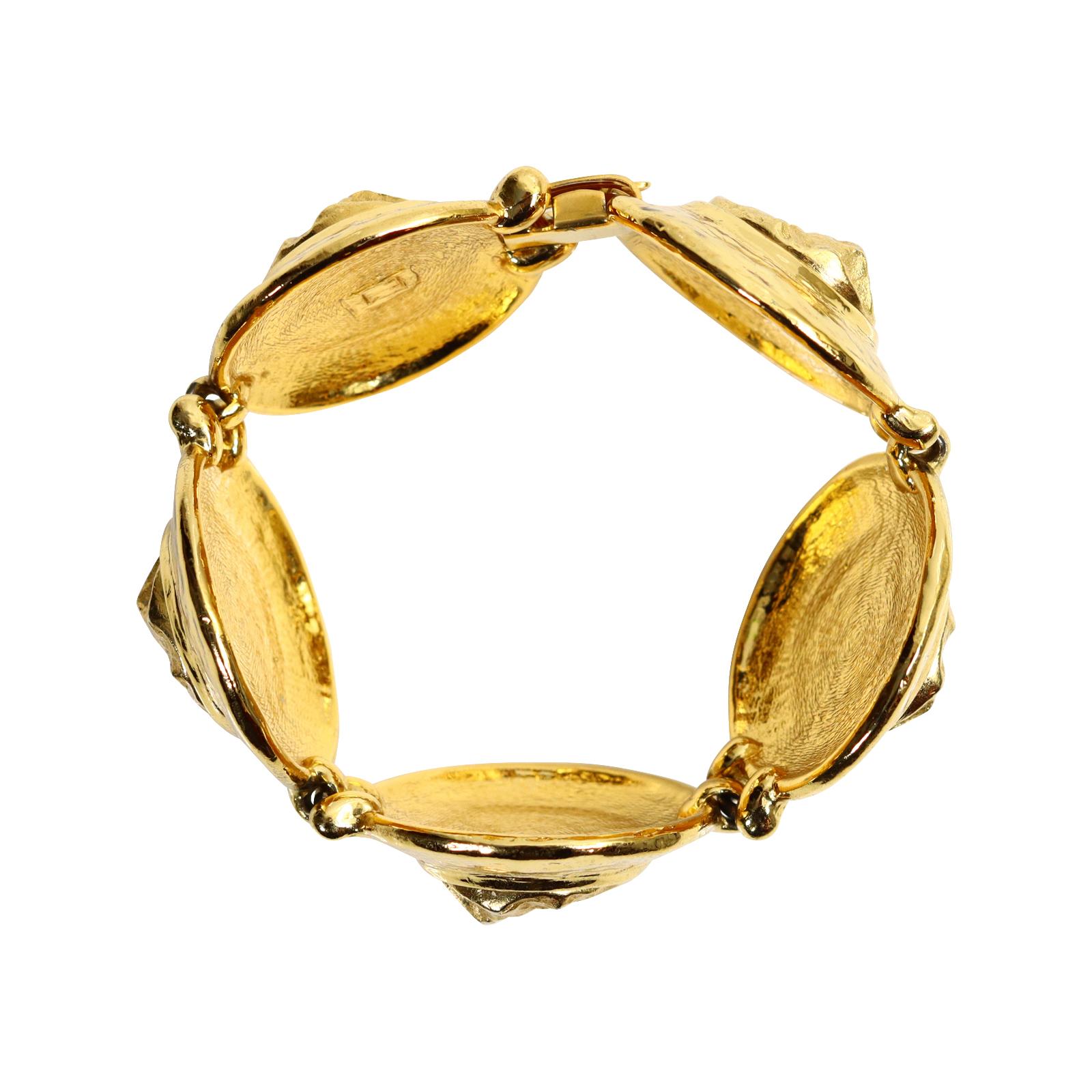 Vintage Yves Saint Laurent YSL Gold Tone Round Heavy Bracelet Circa 1980s In Good Condition For Sale In New York, NY