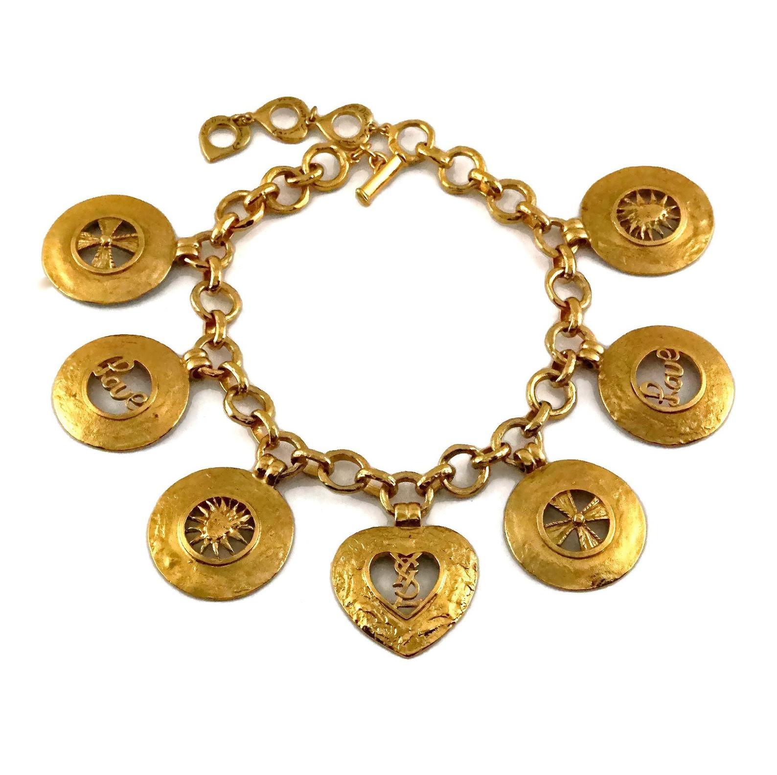 Vintage YVES SAINT LAURENT Ysl Iconic Emblem Disc Medallion Charm Necklace

Measurements:
Height: 2.20 inches (5.6 cm)
Wearable Length: 16.33 inches (41.5 cm) until 18.30 inches (46.5 cm)

Features:
- 100% Authentic YVES SAINT LAURENT.
- 7 Chunky