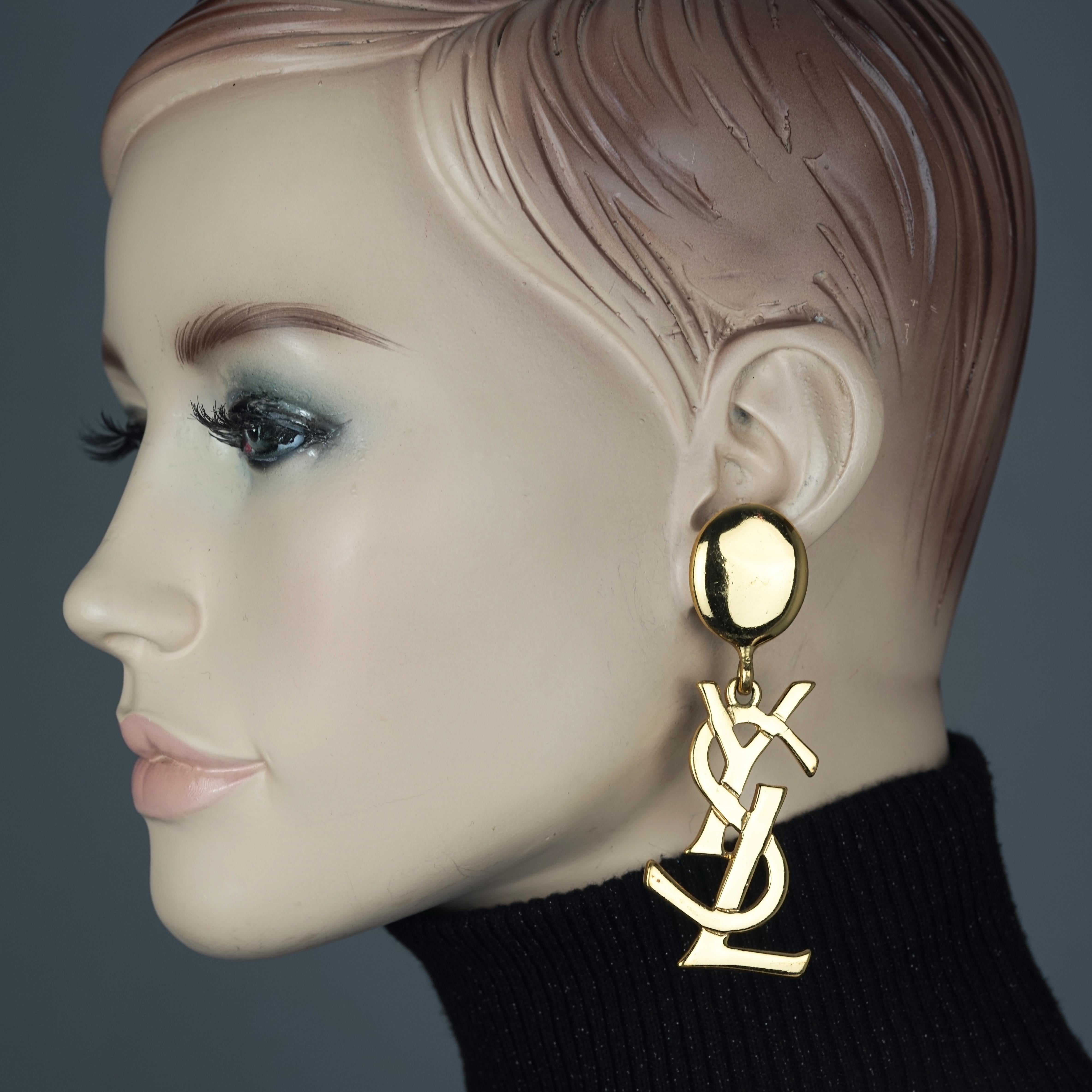 Vintage YVES SAINT LAURENT Ysl Iconic Logo Drop Earrings - Sex and The City
As seen on Samantha Jones (Kim Cattrall) in Sex and the City movie.

Measurements:
Height: 3.34 inches (8.5 cm)
Width: 1.37 inches (3.5 cm)
Weight per Earring: 17