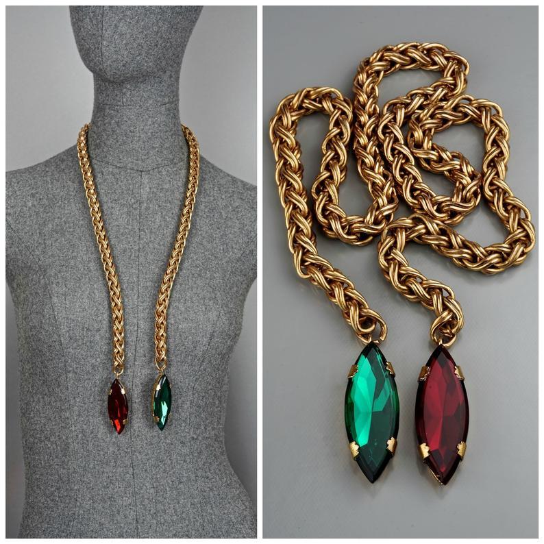 Vintage YVES SAINT LAURENT Ysl Jeweled Lariat Necklace

Measurements:
Width: 0.87 inch (2.2 cm)
Length: 35.83 inches (91 cm)

Features:
- 100% Authentic YVES SAINT LAURENT.
- Chunky chain that terminates with red and green rhinestones.
- No