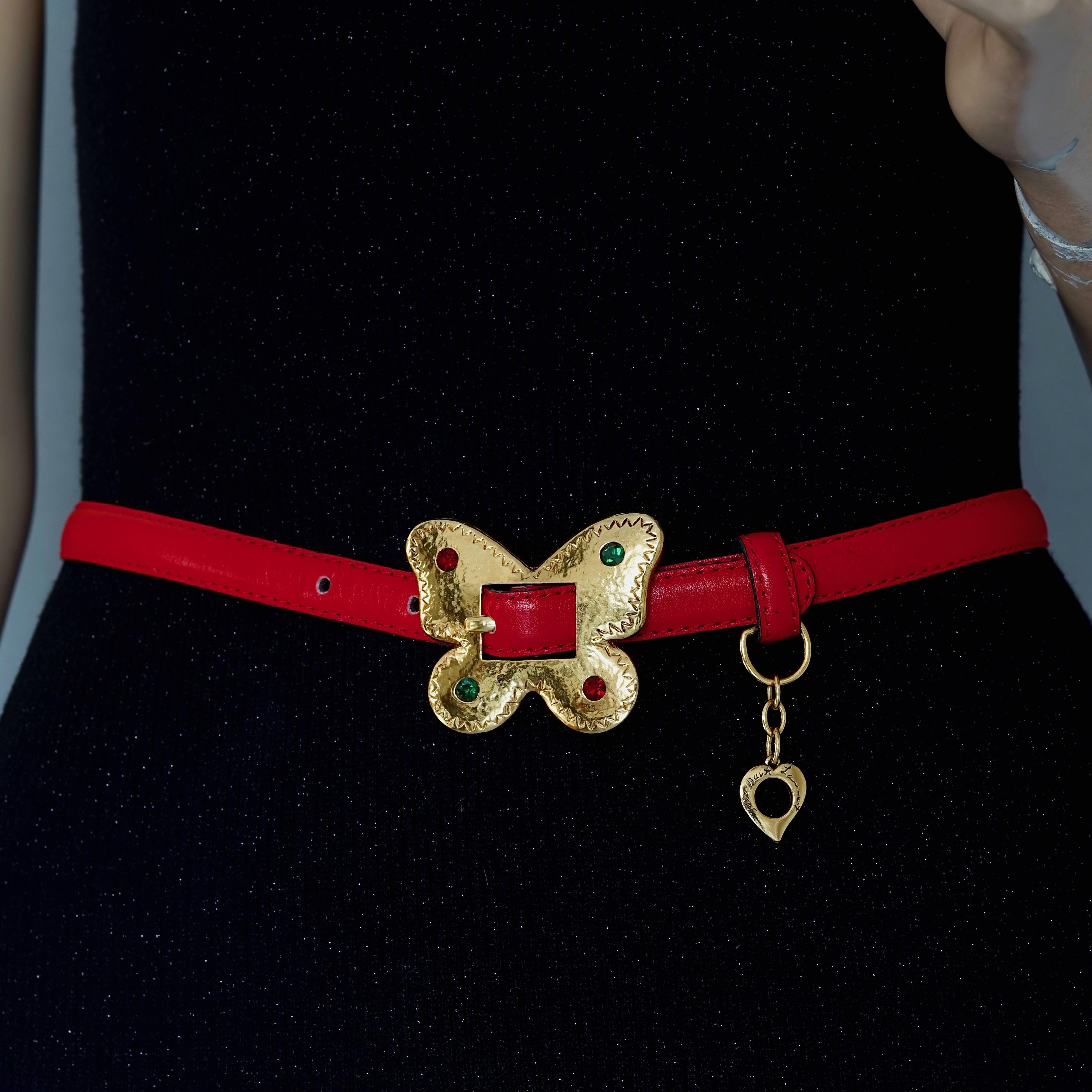 Vintage YVES SAINT LAURENT Ysl Jewelled Butterfly Red Leather Belt

Measurements:
Buckle Height: 1.96 inches (5 cm)
Buckle Width: 2.44 inches (6.2 cm)
Strap Height: 0.59 inch (1.5 cm)
Wearable Length: 28.34 inches to 29.92 inches (72 cm to 76