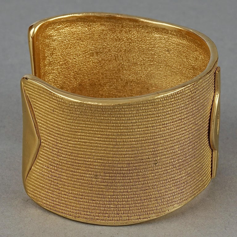 Vintage YVES SAINT LAURENT Ysl Logo Asymmetric Cuff Bracelet at 1stDibs
