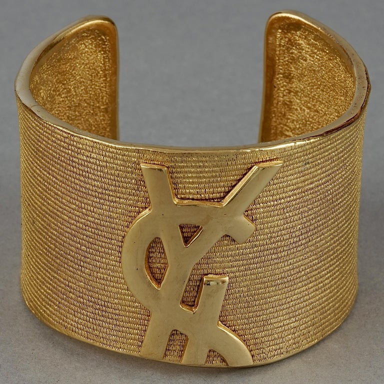 Vintage YVES SAINT LAURENT Ysl Logo Asymmetric Cuff Bracelet at 1stDibs