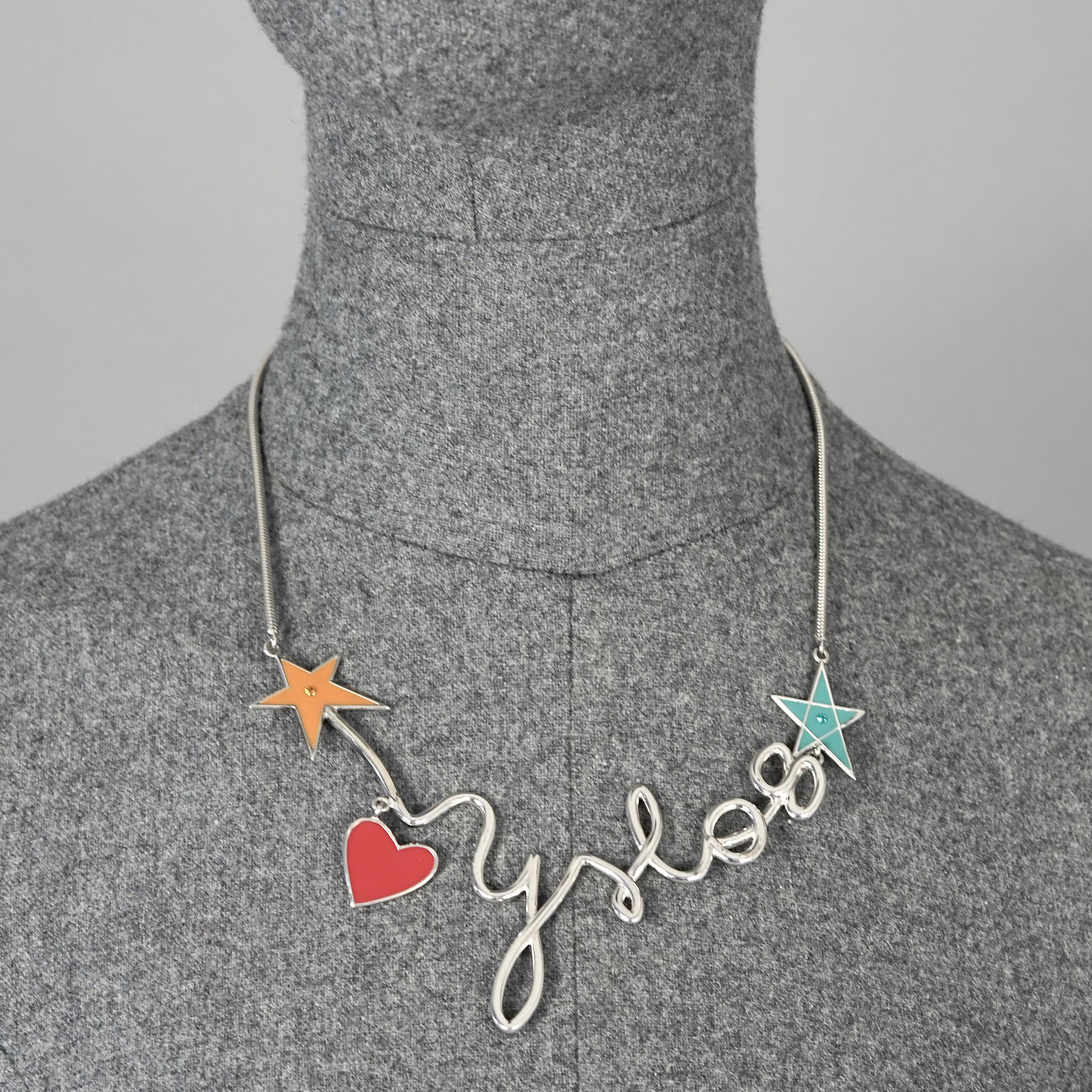 Vintage YVES SAINT LAURENT Ysl Logo Cursive Pop Heart Star Necklace

Measurements:
Height: 1.77 inches (4.5 cm) letter Y
Wearable Length: 14.96 inches (38 cm) to 18.11 inches (46 cm)

Features:
- 100% Authentic YVES SAINT LAURENT.
- YSL 08 in