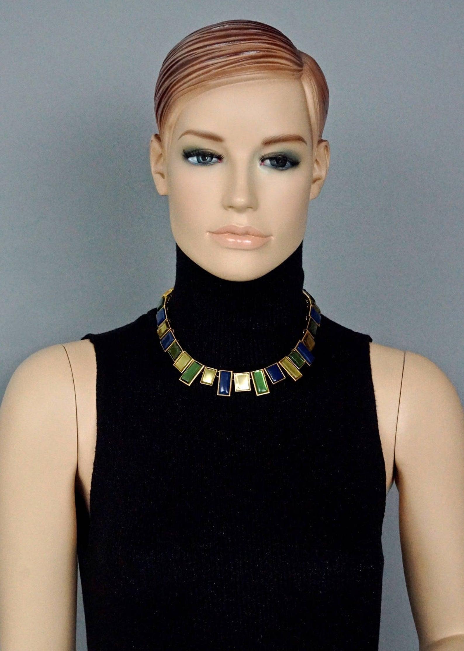 Vintage YVES SAINT LAURENT Ysl Mondrian Geometric Resin Necklace

Measurements:
Height: 0.94 inch (2.4 cm)
Width: 17.32 inches to 20.86 inches (44 cm to 53 cm)

Features:
- 100% Authentic YVES SAINT LAURENT.
- Articulated geometric colored resin in