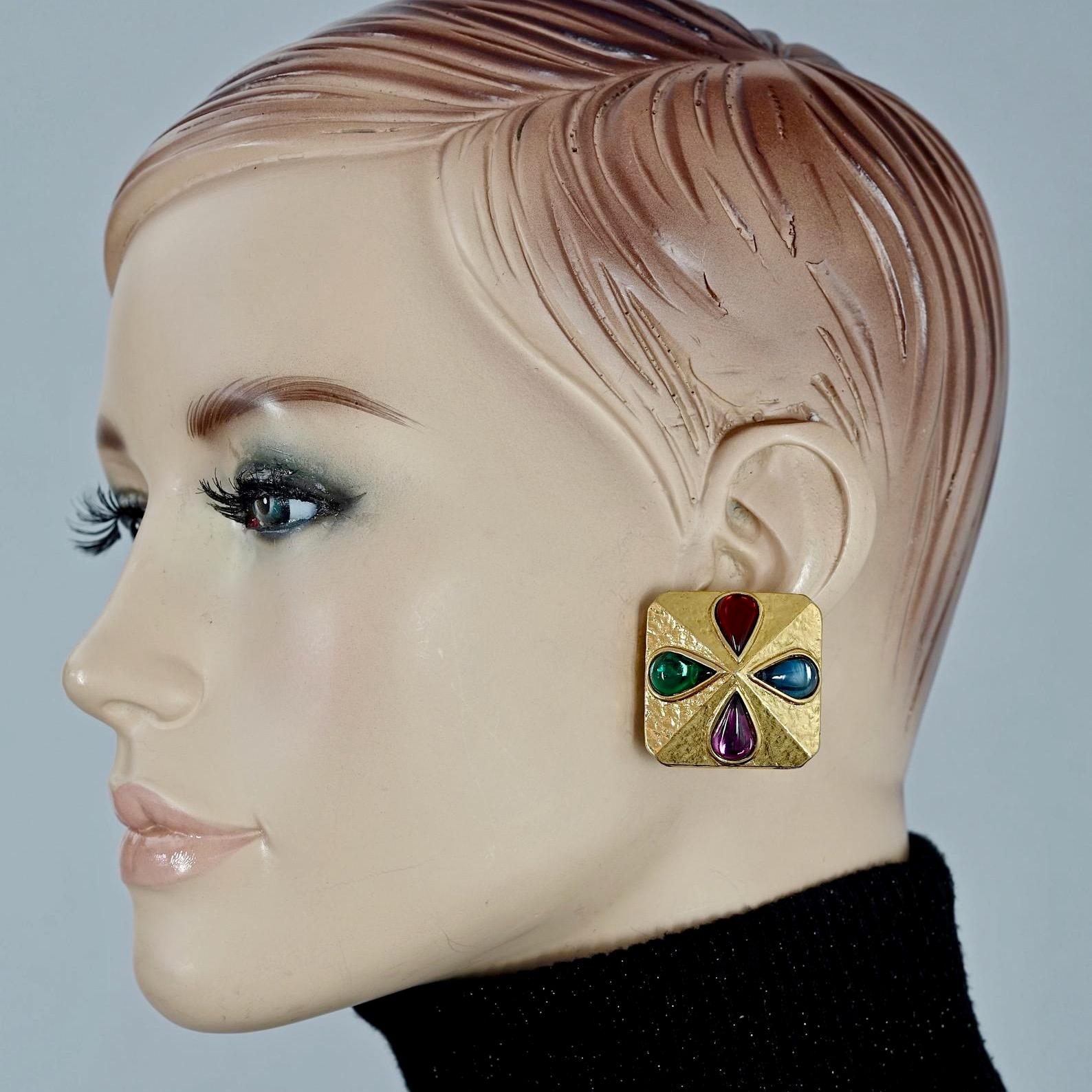 Vintage YVES SAINT LAURENT Ysl Multi Coloured Cabochon Flower Earrings

Measurements:
Height: 1.30 inches (3.3 cm)
Width: 1.30 inches (3.3 cm)
Weight per Earring: 25 grams

Features:
- 100% Authentic YVES SAINT LAURENT.
- Square earrings with multi