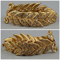 Bracciale vintage Yves Saint Laurent Ysl con strass e fiocco a forma di foglia