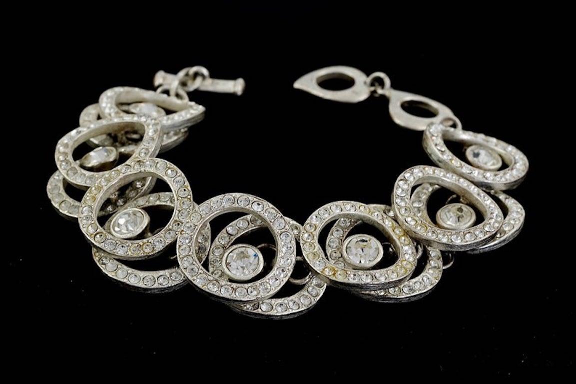 Vintage YVES SAINT LAURENT Ysl Rhinestone Hoop Chain Bracelet

Measurements:
Height: 0.98 inch (2.5 cm)
Wearable Length: 8.46 inches to 9.44 inches (21.5 cm to 24 cm)

Features:
- 100% Authentic YVES SAINT LAURENT.
- Hoop chain bracelet studded with