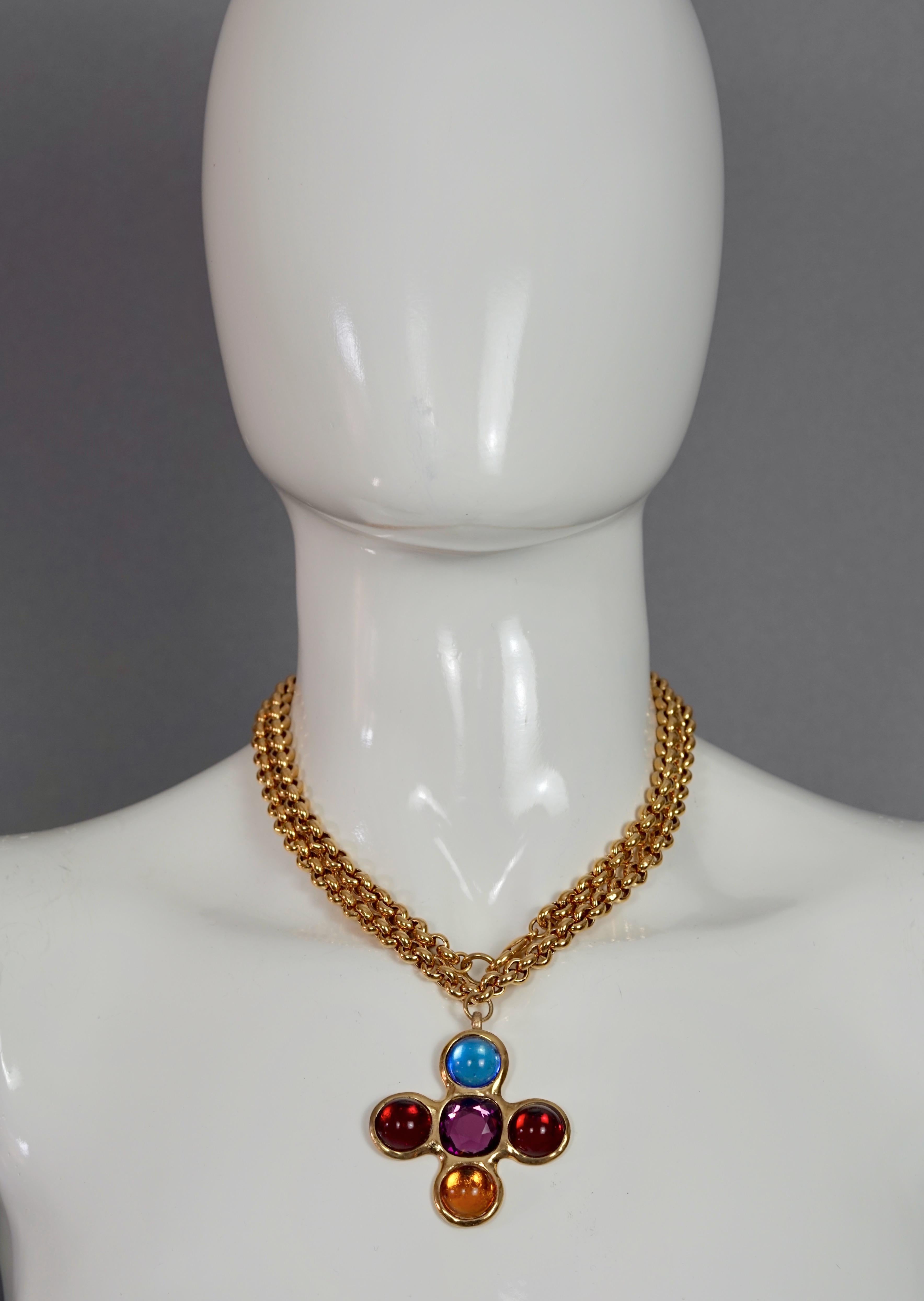 Vintage YVES SAINT LAURENT Ysl Robert Goossens Jewelled Cross Pendant Necklace

Measurements:
Height: 2.08 inches (5.3 cm)
Width: 2.08 inches (5.3 cm)

Features:
- 100% Authentic YVES SAINT LAURENT.
- Cross pendant with multicoloured cabochons.
-