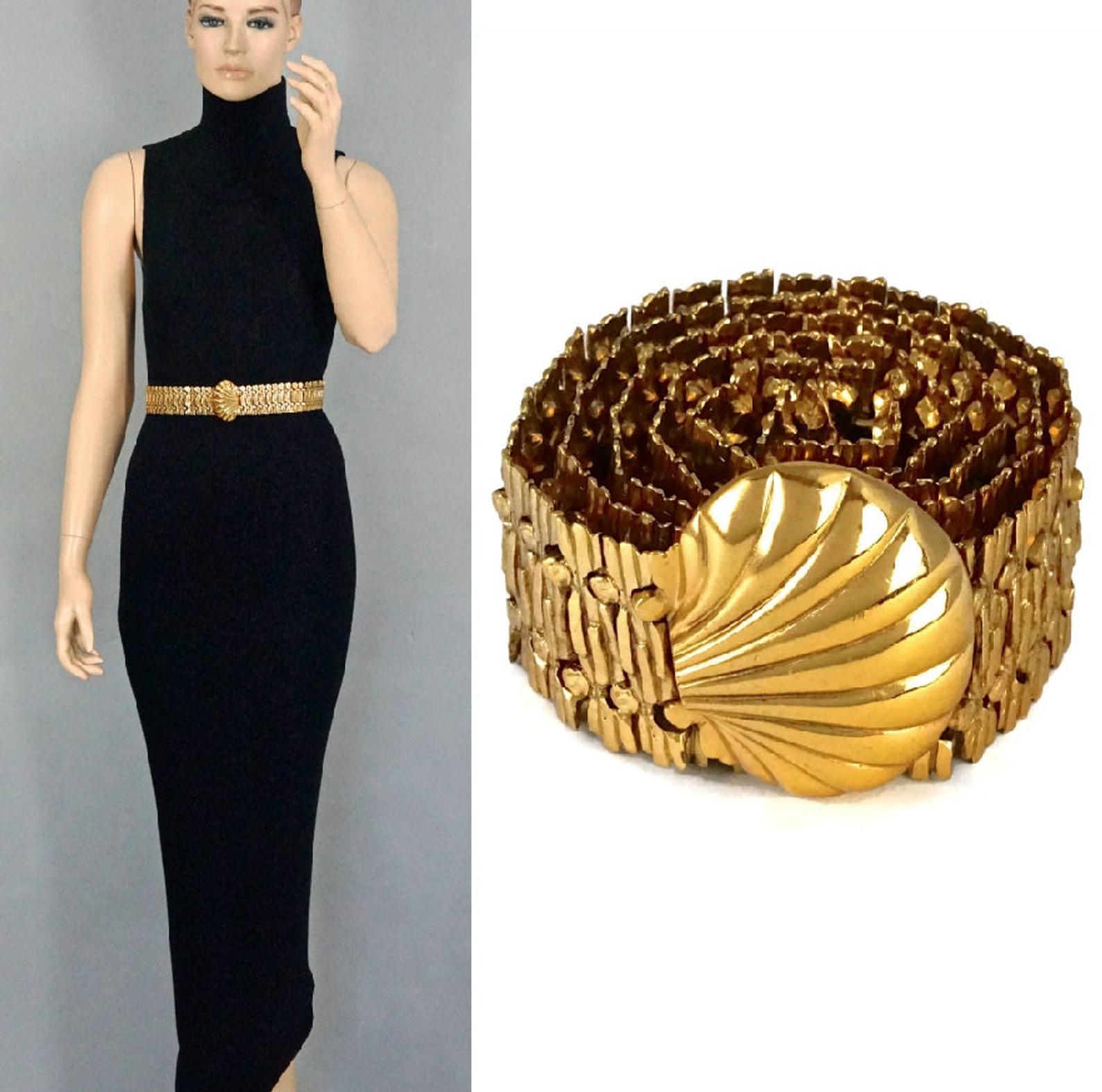 Vintage YVES SAINT LAURENT Ysl Shell Textured Metal Belt

Measurements:
Height: 2.16 inches (5.5 cm)
Wearable Length: 28.15 inches, 28.74 inches and 29.33 inches (71.5 cm, 73 cm to 74.5 cm)
Total Length: 33.85 inches (86 cm) including shell
Weight: