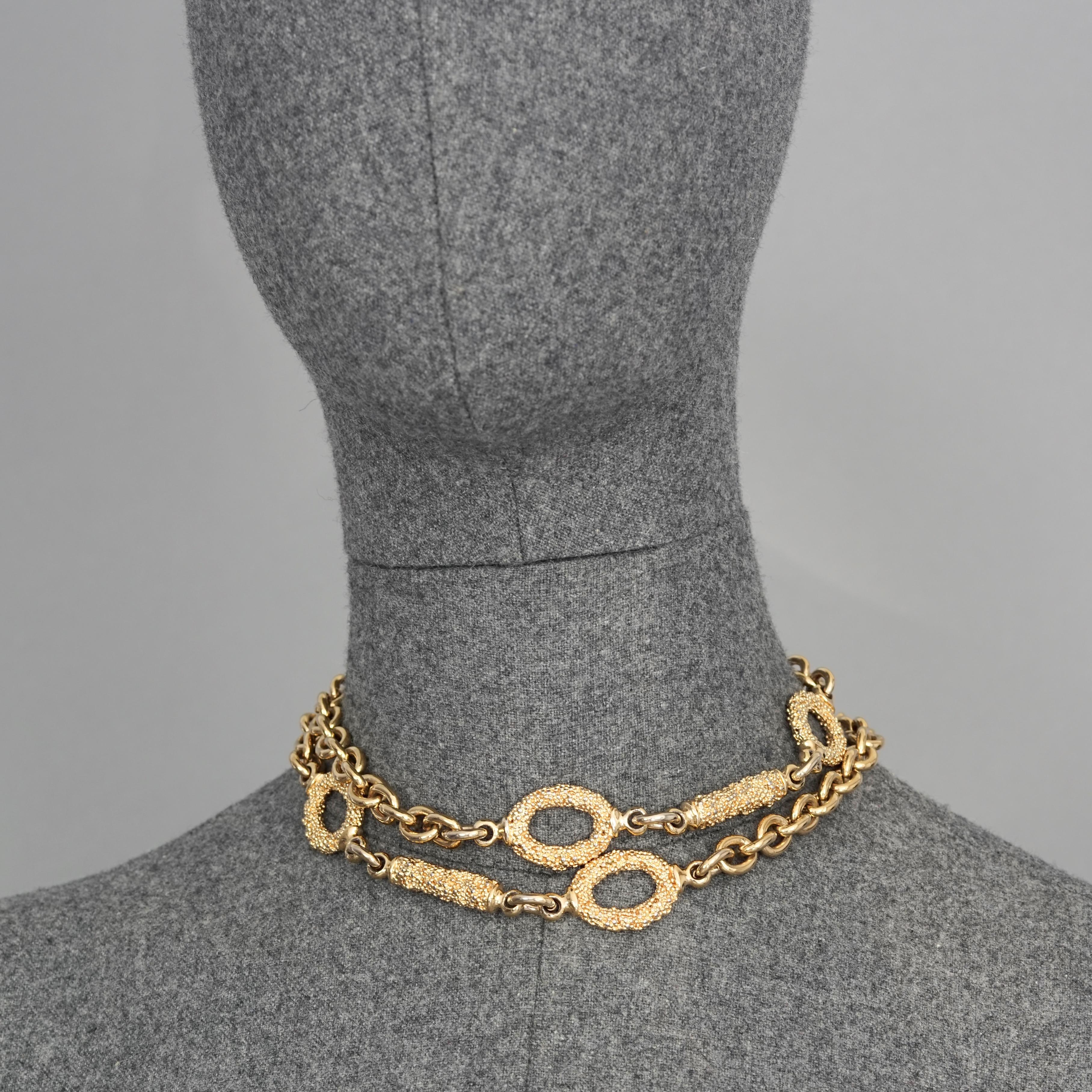 Vintage YVES SAINT LAURENT Ysl Textured Oval and Bar Chain Necklace Belt

Measurements:
Diameter: 0.78 inch (2 cm)
Adjustable Length: 36.22 inches (92 cm) 

Features:
- 100% Authentic YVES SAINT LAURENT.
- Chain with textured oval and bar accents.
-