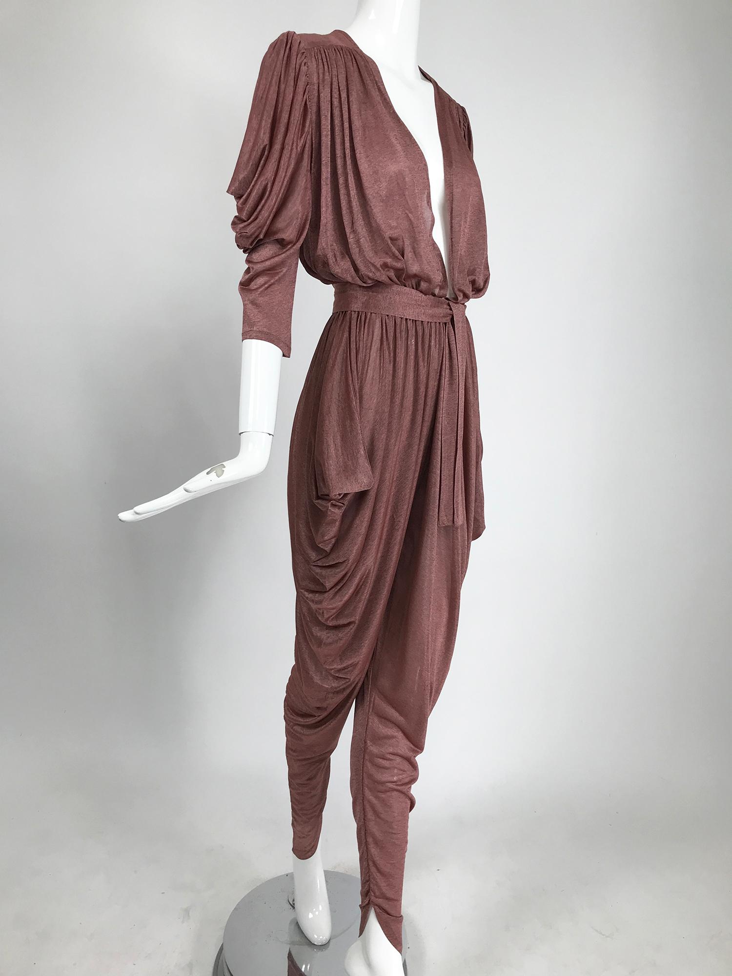 Vintage Yvonne Jacovou at Cornelius W1 London, plunge draped jumpsuit from the Bowie, Ziggy Stardust era 1970s. Silky sheer fabric in a cocoa rose fleck, this is the epitome of early disco finery. Deep plunge neckline jumpsuit has angled draped