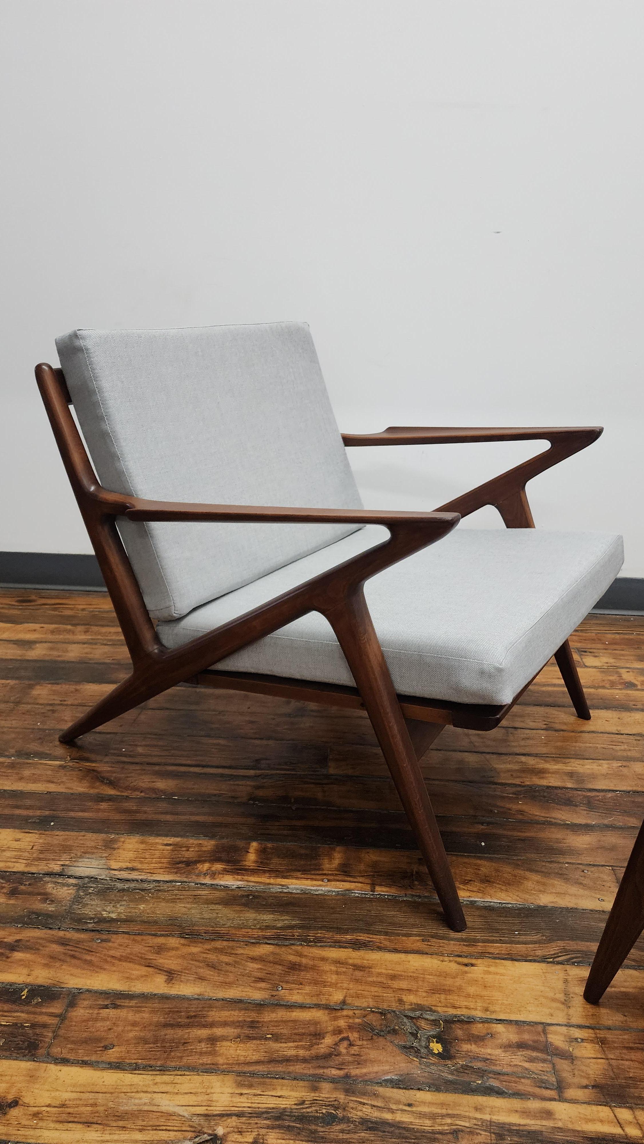 Beautiful walnut tone Lounge chair and ottoman called the 
