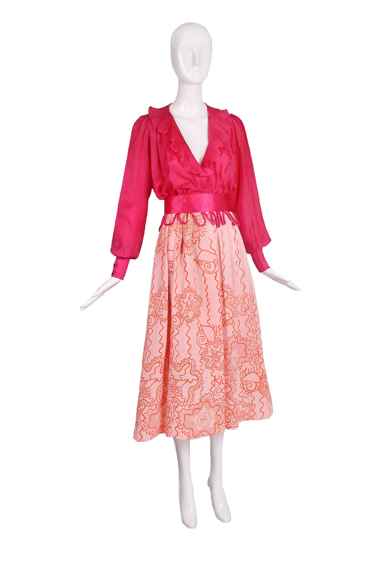 Vintage Zandra Rhodes fuchsia silk poet blouse and pale peach rayon skirt w/orange abstract print & hot pink waist band. Blouse has an oversize fit and is 100% water silk - size tag S. Skirt is 100% rayon - size tag UK 10. Skirt is in excellent
