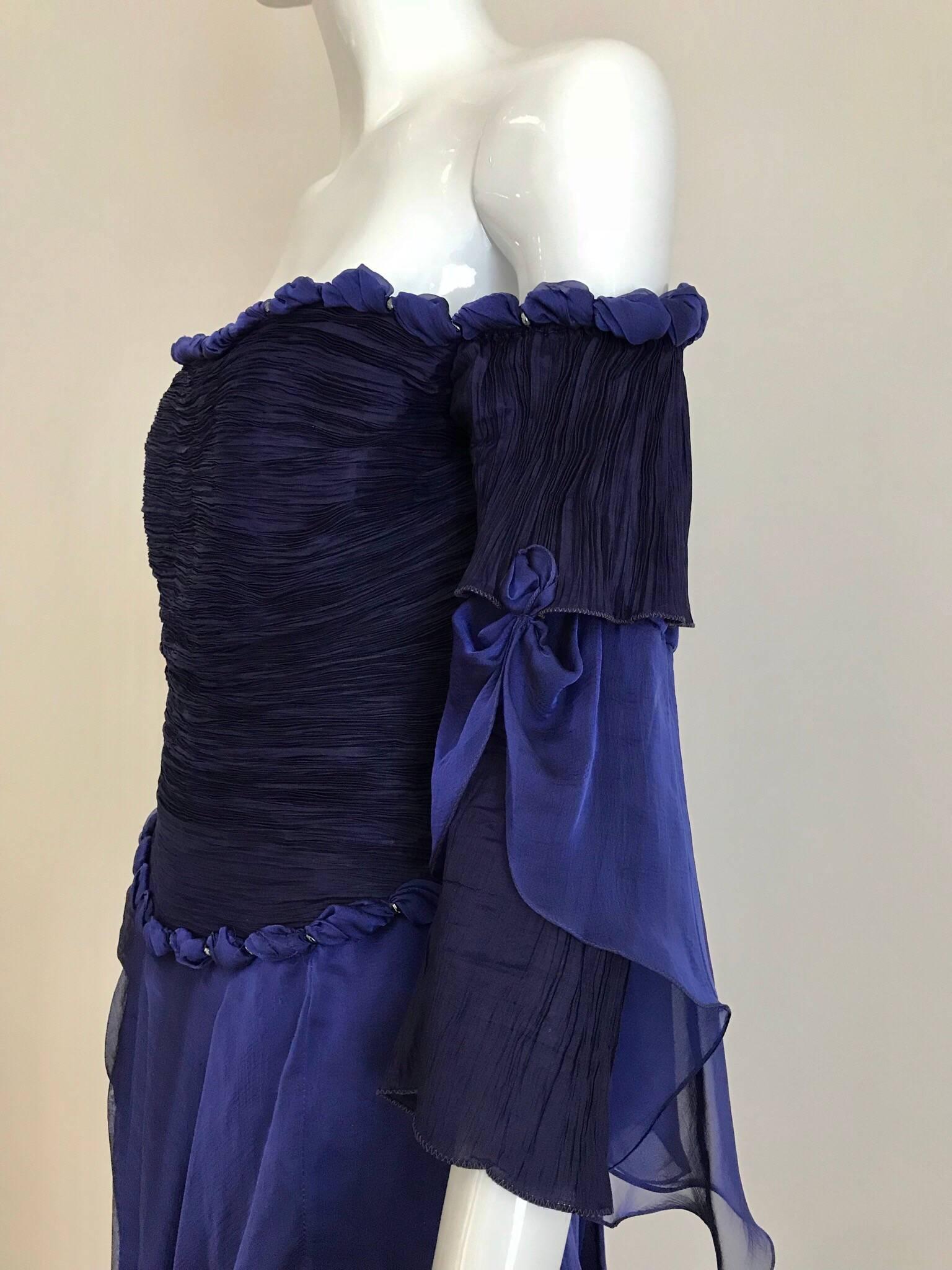 1980s Zandra Rhodes off shoulder purple blue silk chiffon cocktail dress. Fit Size 4
Bust: 34 inches/ Waist: 28 inches 
** minor discoloration inside lining ( see image attached)