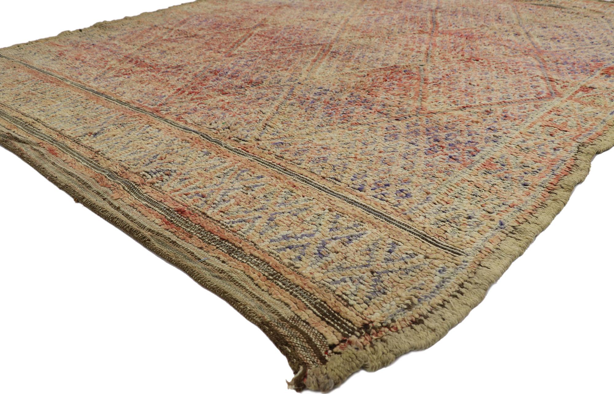 21446 Vintage Beni MGuild Moroccan Rug, 06'09 x 08'05. Originating from the Beni M'Guild tribe nestled in Morocco's Middle Atlas Mountains, Beni M'Guild rugs embody a cherished tradition meticulously handcrafted by skilled Berber women. These rugs
