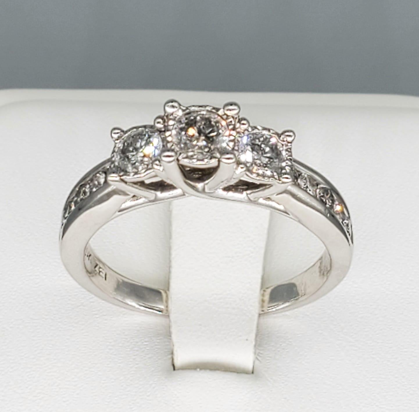 Vintage ZEI 1.50 Carat Diamond Engagement Ring. The ring is gorgeous and is made of white gold and weights 4.1 grams 10k.