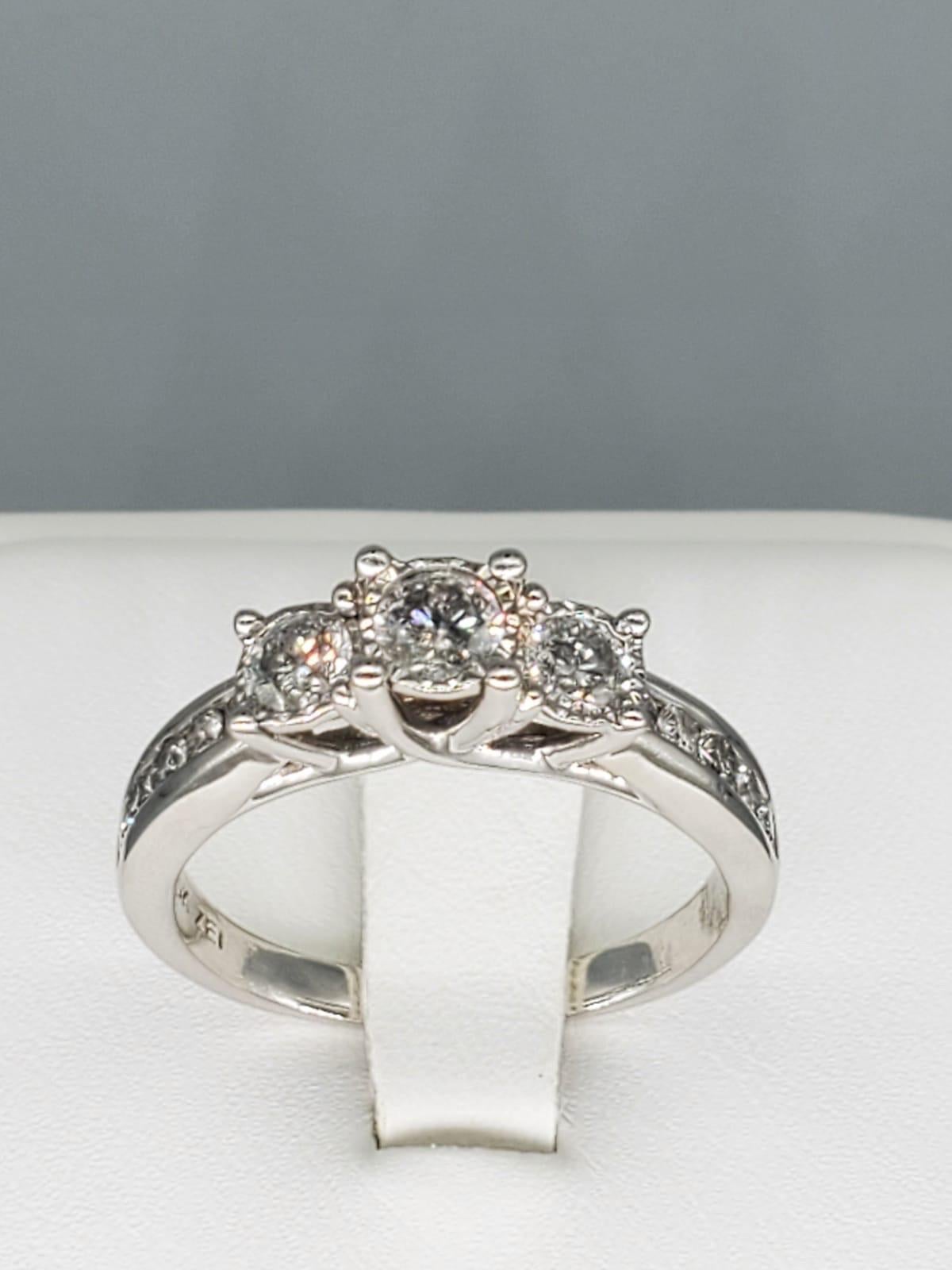Round Cut Vintage ZEI 1.50 Carat Three-Stone Diamond Engagement Ring 10 Karat White Gold For Sale