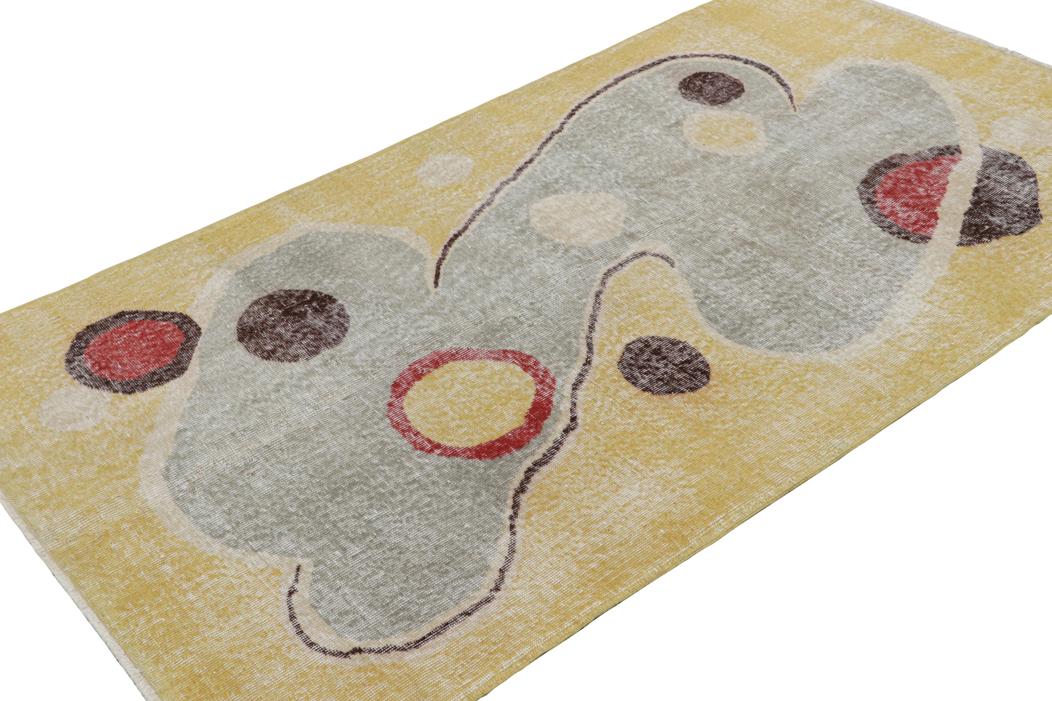 This 4x7 Vintage Art Deco rug is believed to be a rare work from mid-century artist Zeki Müren. Hand-knotted in wool circa 1960-1970, this rug employs a range of playful colors and modern, abstract patterns. 

On the Design: 

Its pops of color