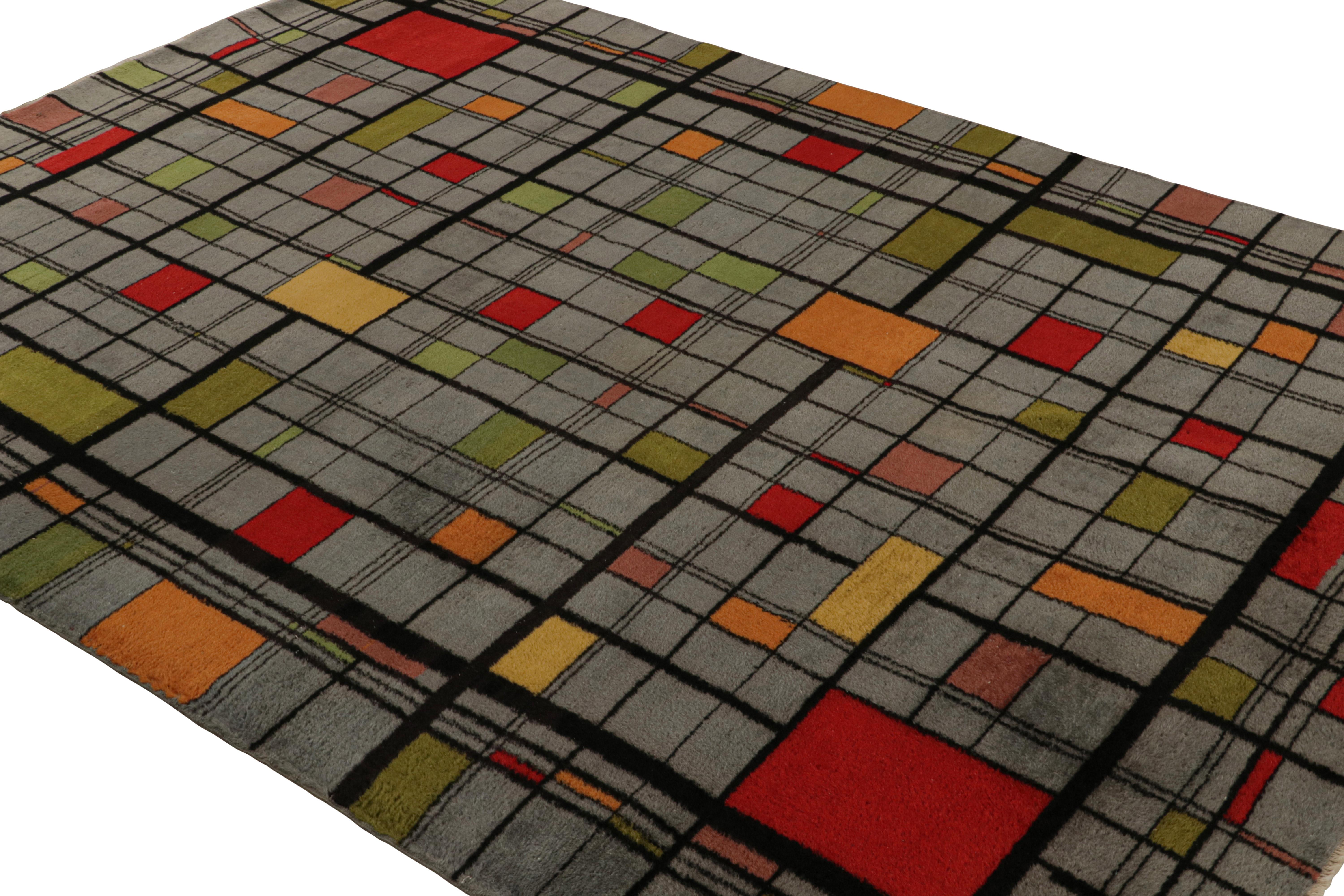 Hand-knotted in wool, circa 1960 - 1970, this 7x9 vintage Müren Art Deco rug features geometric patterns, clearly inspired by the ‘composition’ style paintings from the masters like Piet Mondrian and the many French Art Deco masters who, like Müren,