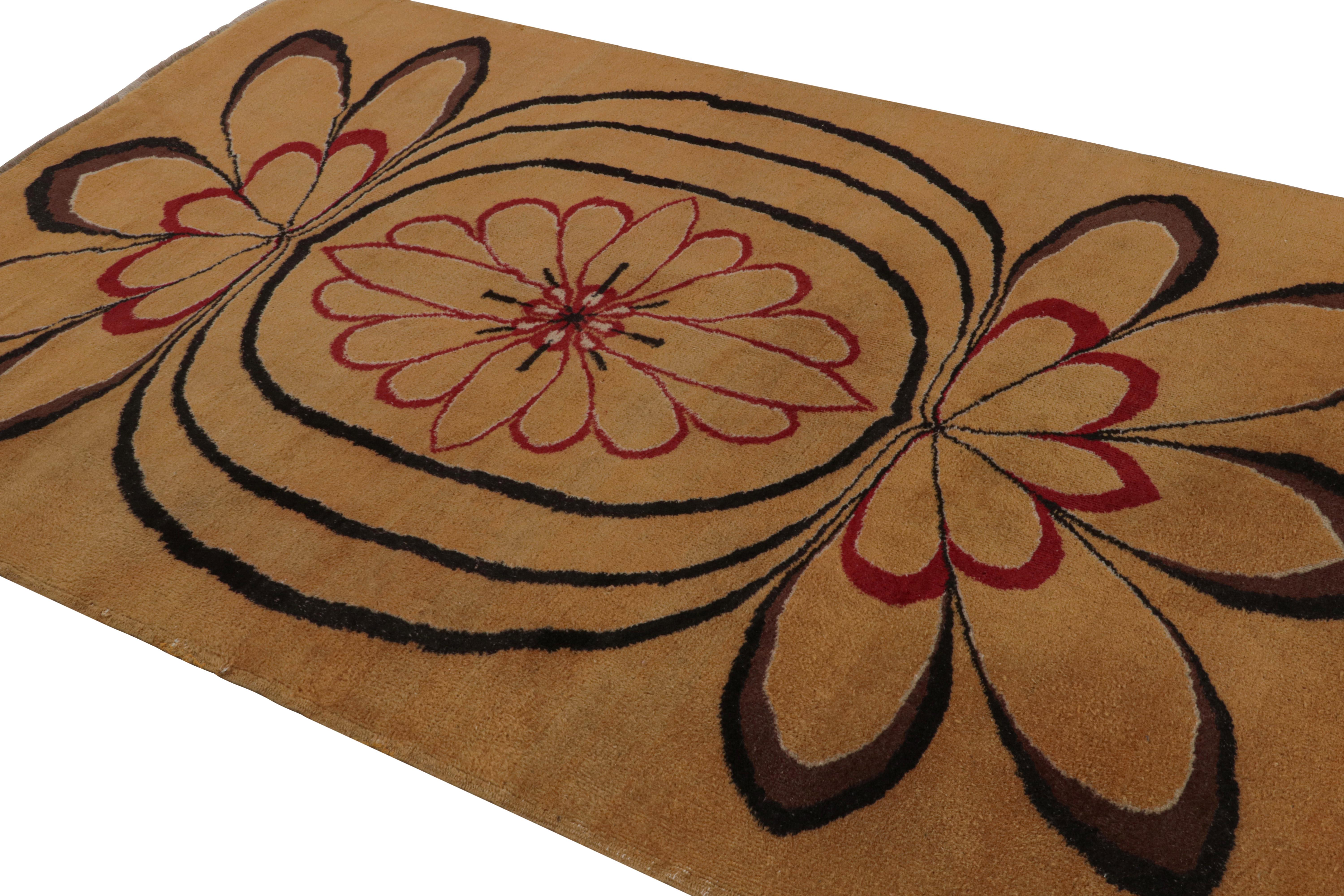 Hand-knotted in wool, circa 1960 - 1970, this 6x8 vintage Müren Art Deco rug is an exciting new addition to the Rug & Kilim Collection. Its design in Ochre with geometric patterns in red and black, is a more minimal take on the French Art Deco