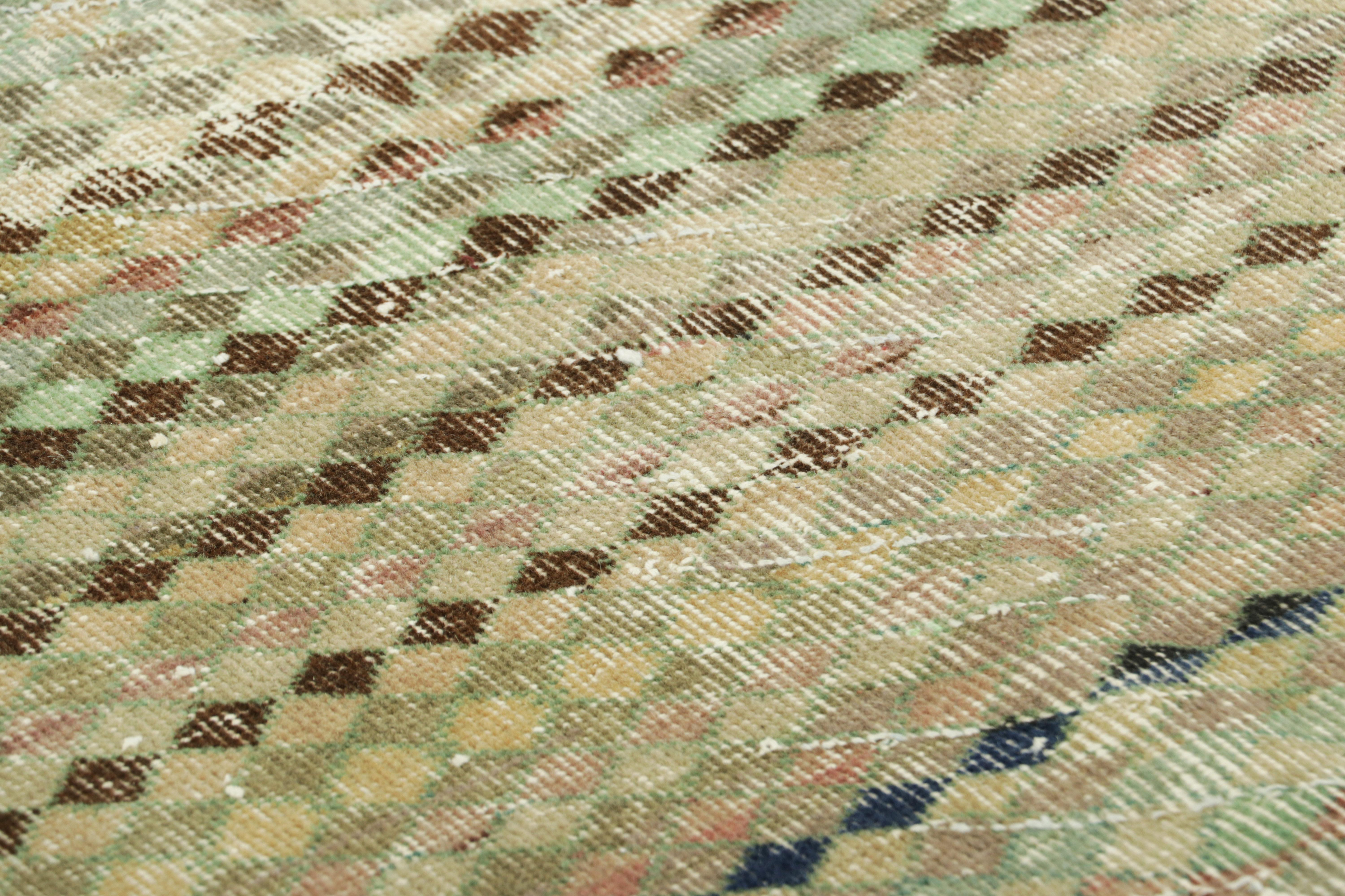 Dieser 3x5 große Vintage-Teppich wurde um 1960-1970 in der Türkei aus handgeknüpfter Wolle hergestellt und ist eine aufregende neue Ergänzung der Mid-Century Pasha Collection'S von Rug & Kilim - einer Reihe unserer Klassiker, die den Werken des