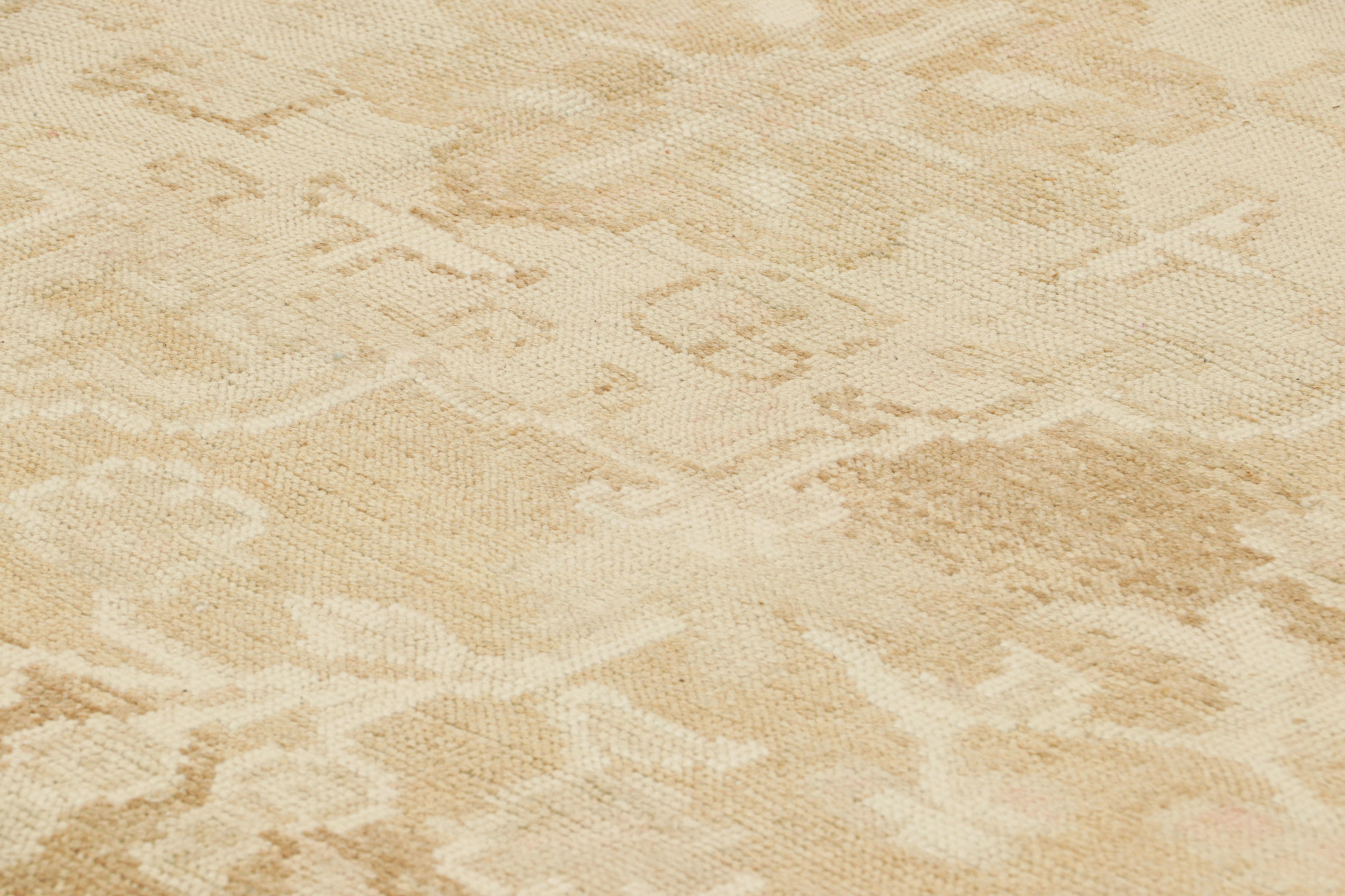 Made with hand-knotted wool and originating from Turkey circa 1960 – 1970, this 7x11 vintage Oushak rug is a unique addition to the Rug & Kilim Collection—an exemplary find among young Oushak carpets for its muted colors and patterns alike.

On the