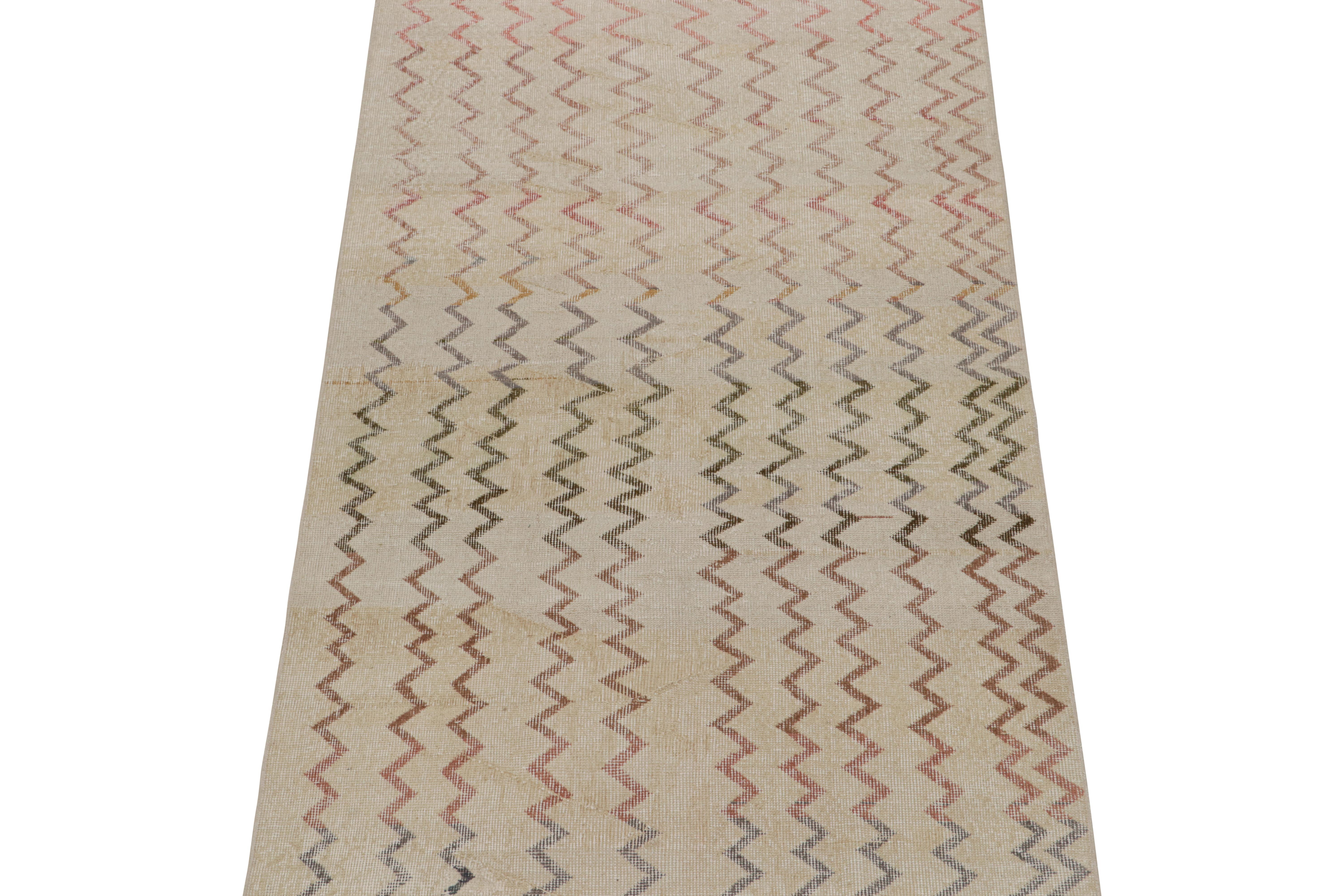 This vintage 4x7 rug is a new addition to Rug & Kilim’s Mid-Century Pasha Collection. This line is a commemoration, with rare curations we believe to hail from multidisciplinary Turkish designer Zeki Müren.
 
Hand-knotted in wool circa 1960-1970,