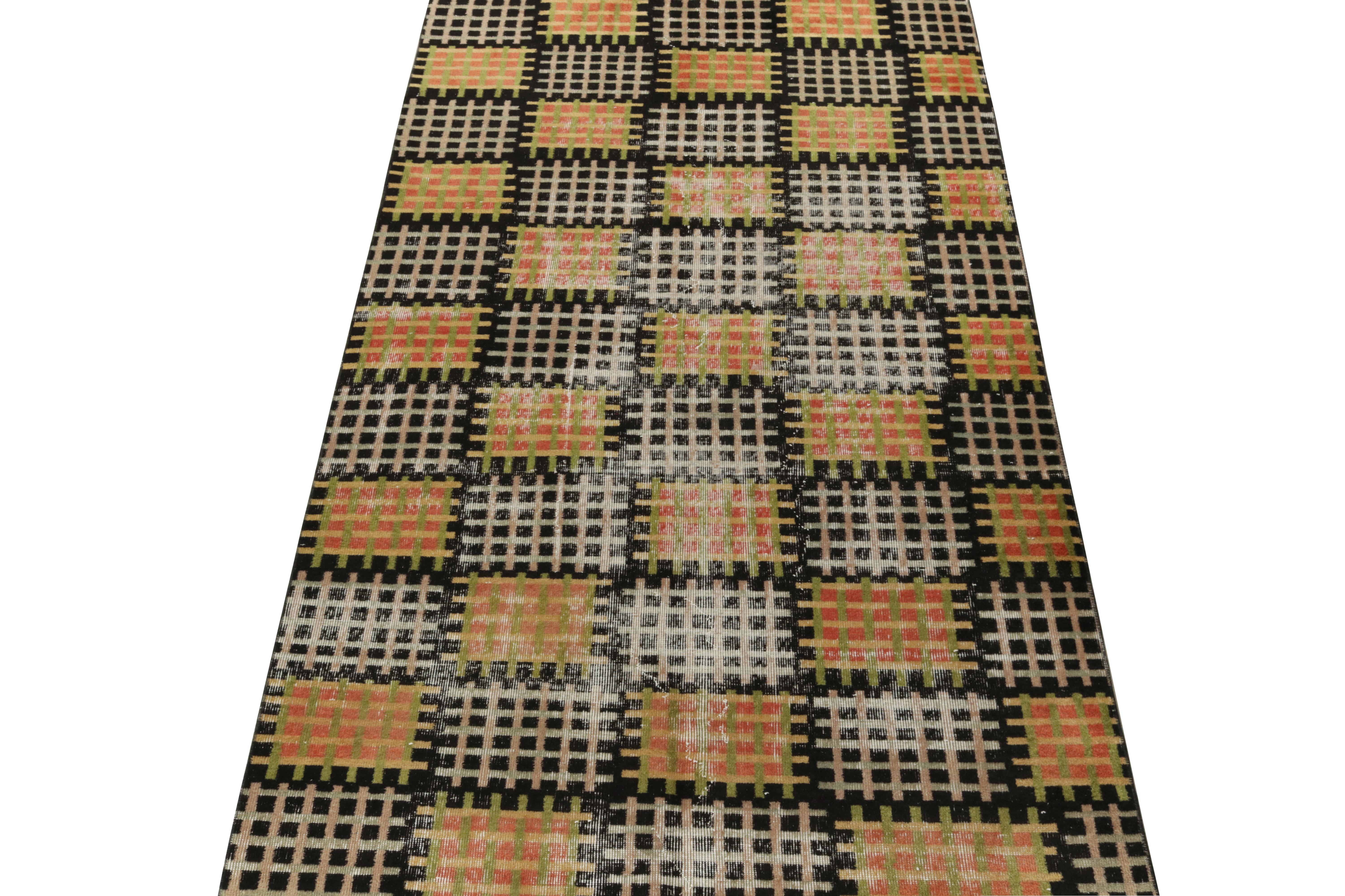 A handk-notted vintage Turkish piece coming from the 1960s, crafted by the celebrated Turkish designer Zeki Müren—the latest to join Rug & Kilim’s commemorative Mid-Century Pasha collection. The 5x9 distressed style rug enjoys a mesh pattern in