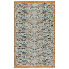 Tapis vintage Zeki Muren bleu et orange, avec motifs floraux de Rug & Kilim
