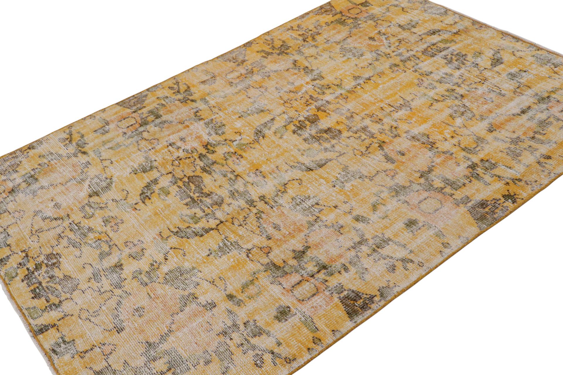 Hand-knotted in wool, circa 1960-1970, a 5x8 vintage rug believed to hail from Zeki Müren - latest to join Rug & Kilim’s collection of vintage selections. 

On the Design: 

This vintage rug carries an all over floral pattern in brown atop gold.