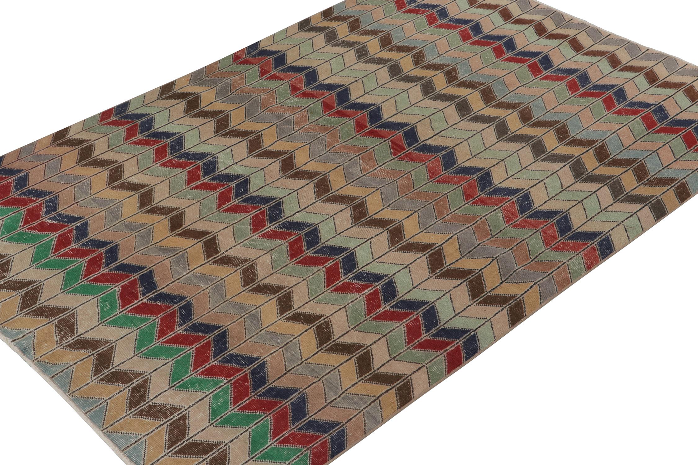 A vintage 6x9 rug from an innovative Turkish atelier, entering Rug & Kilim’s commemorative Mid-Century Pasha Collection.
Further on the Design:
This industrial art Deco piece enjoys a dextrous geometric pattern alternating in polychromatic