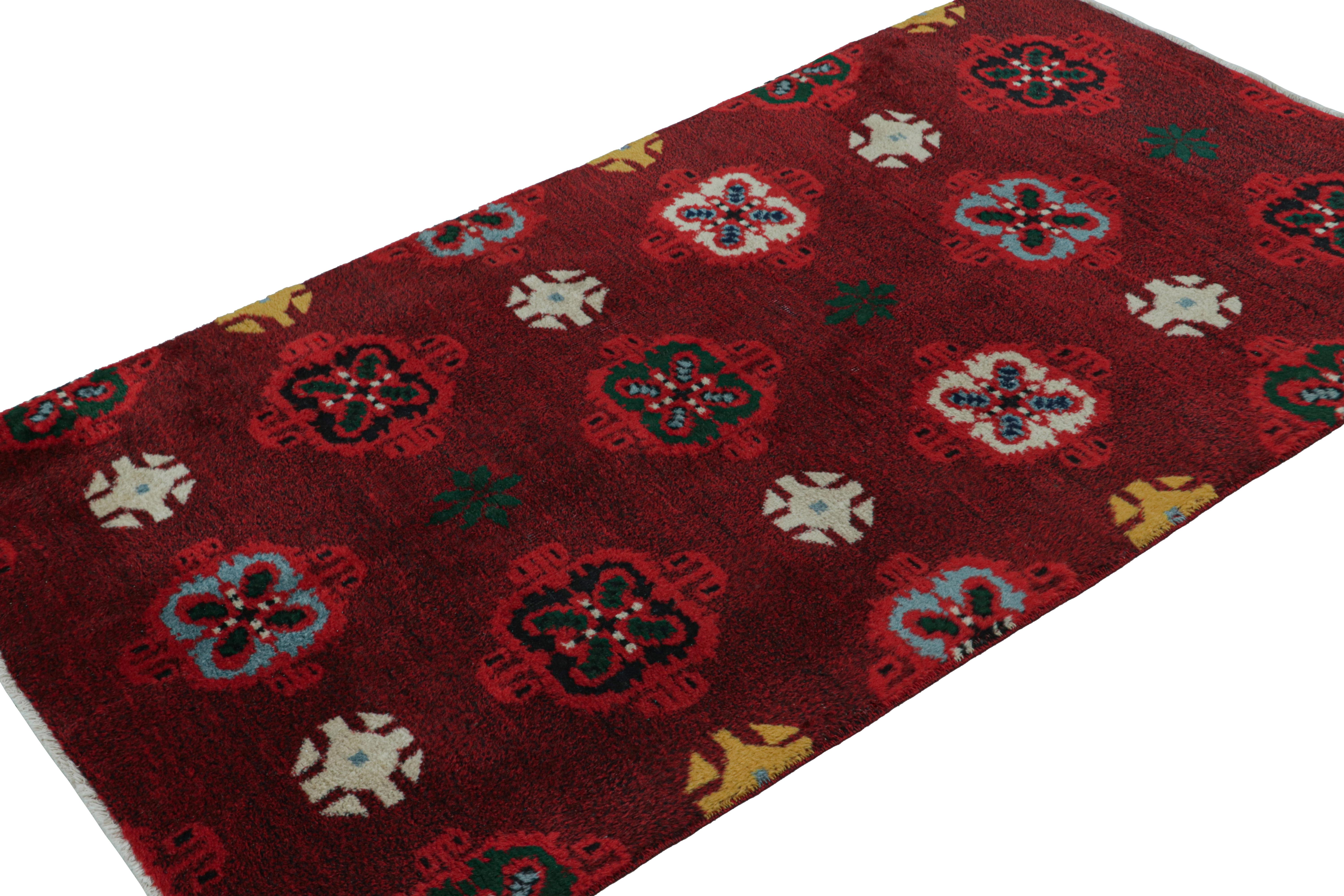 Hand-knotted in wool, circa 1960 - 1970, this 4x6 vintage rug believed to hail from Zeki Muren - latest to join Rug & Kilim’s Mid Century Pasha collection. 

On the Design: 

The rug carries polychromatic geometric patterns on a rich red field. Keen