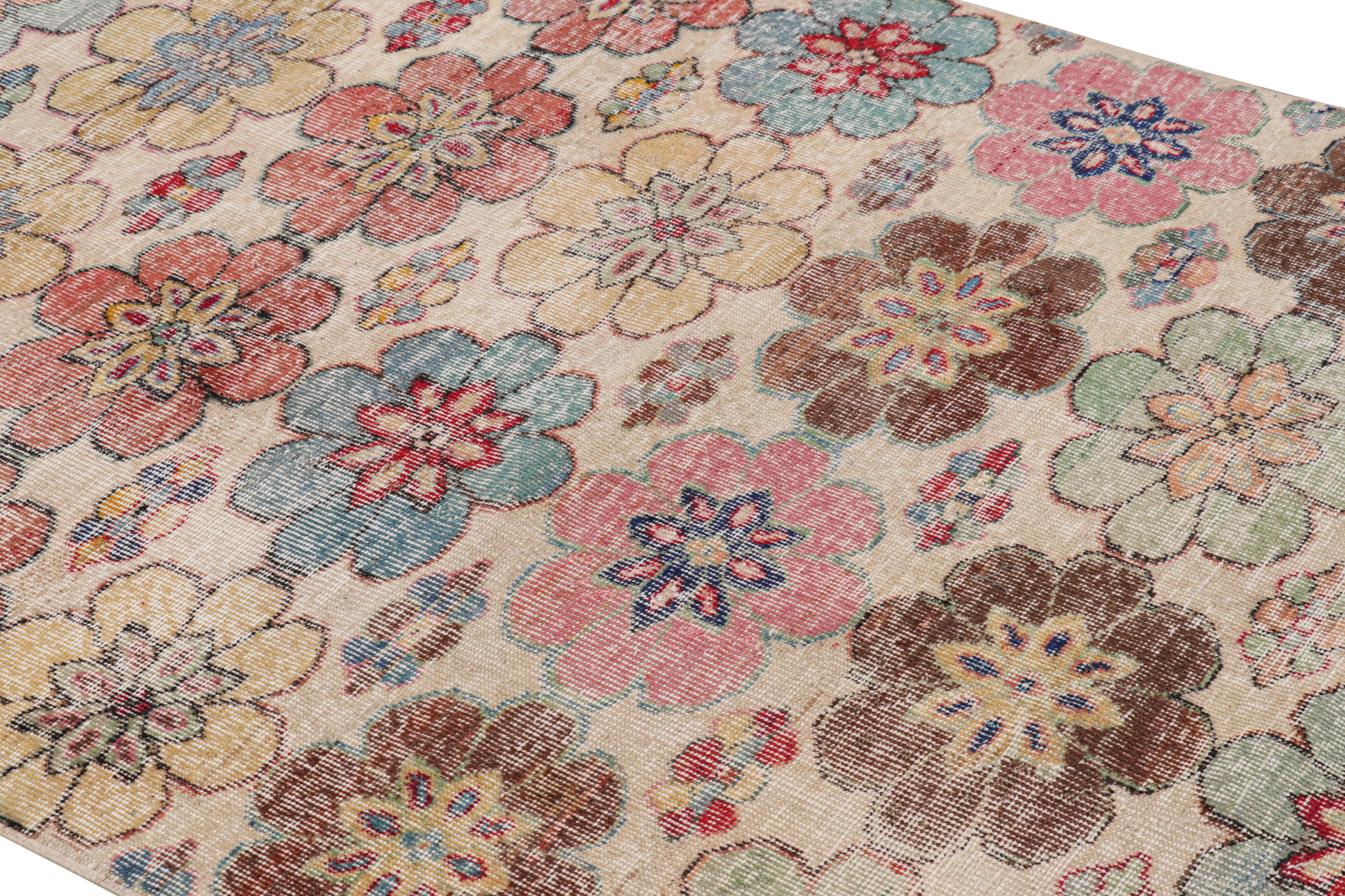 Hand-knotted in wool and originating from Turkey circa 1960 – 1970, this 5×7 vintage Zeki Müren rug is a unique addition to the Rug & Kilim Collection for its wide range of colors and floral patterns across the field

On the Design: 

A light beige