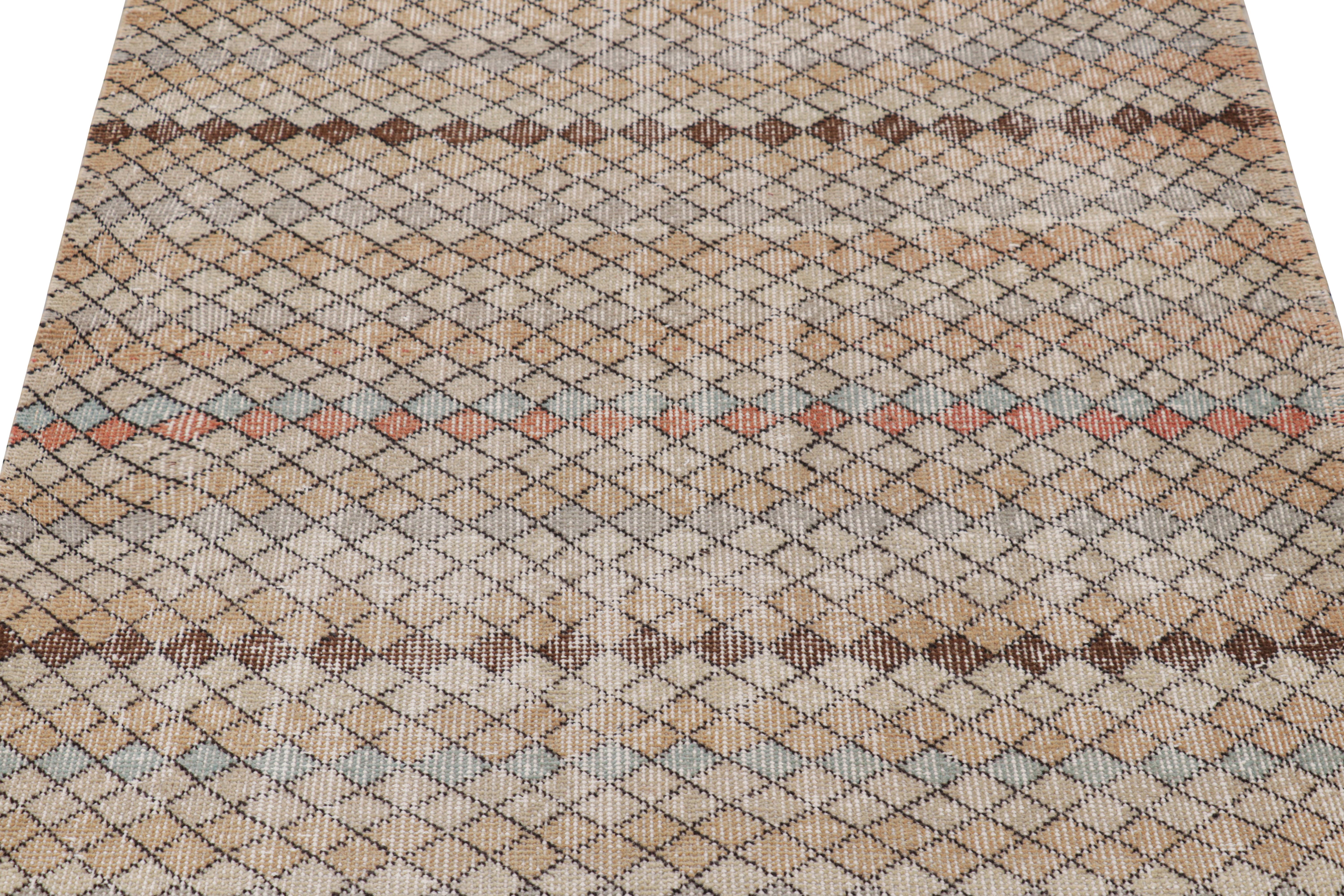 Hand-knotted in wool and originating from Turkey circa 1960 – 1970, this 3x7 vintage Zeki Müren rug is a unique addition to the Rug & Kilim Collection for its wide range of colors and geometric patterns across the field

On the Design: 

Admirers of