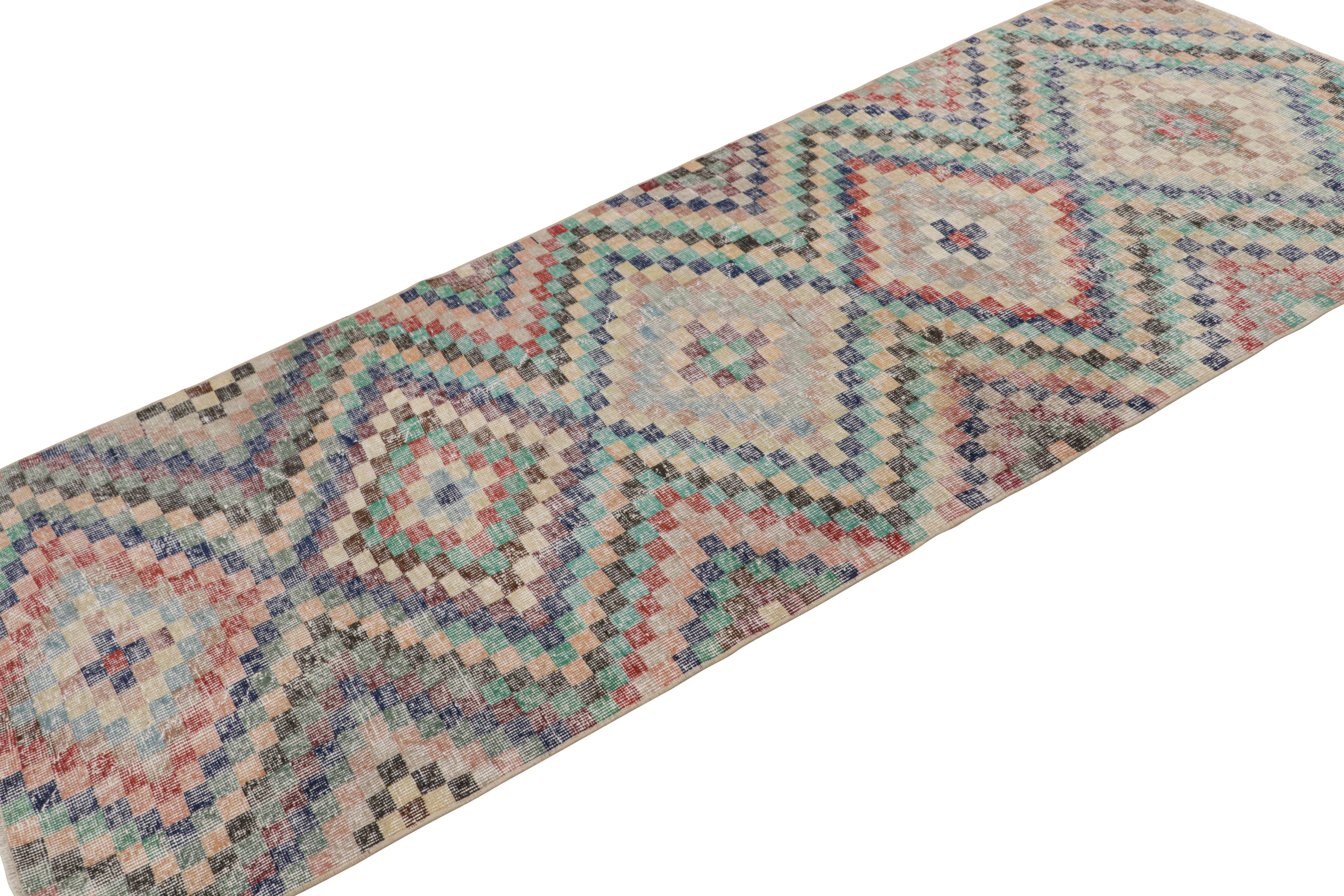 This vintage Zeki Müren 3x9 runner rug, hand-knotted in wool, circa 1960-1970, is inspired by Turkish Kilim sensibilities in its drawing and scale adapted to a more colorful mid-century interpretation. 

On the Design: 

Connoisseurs will appreciate