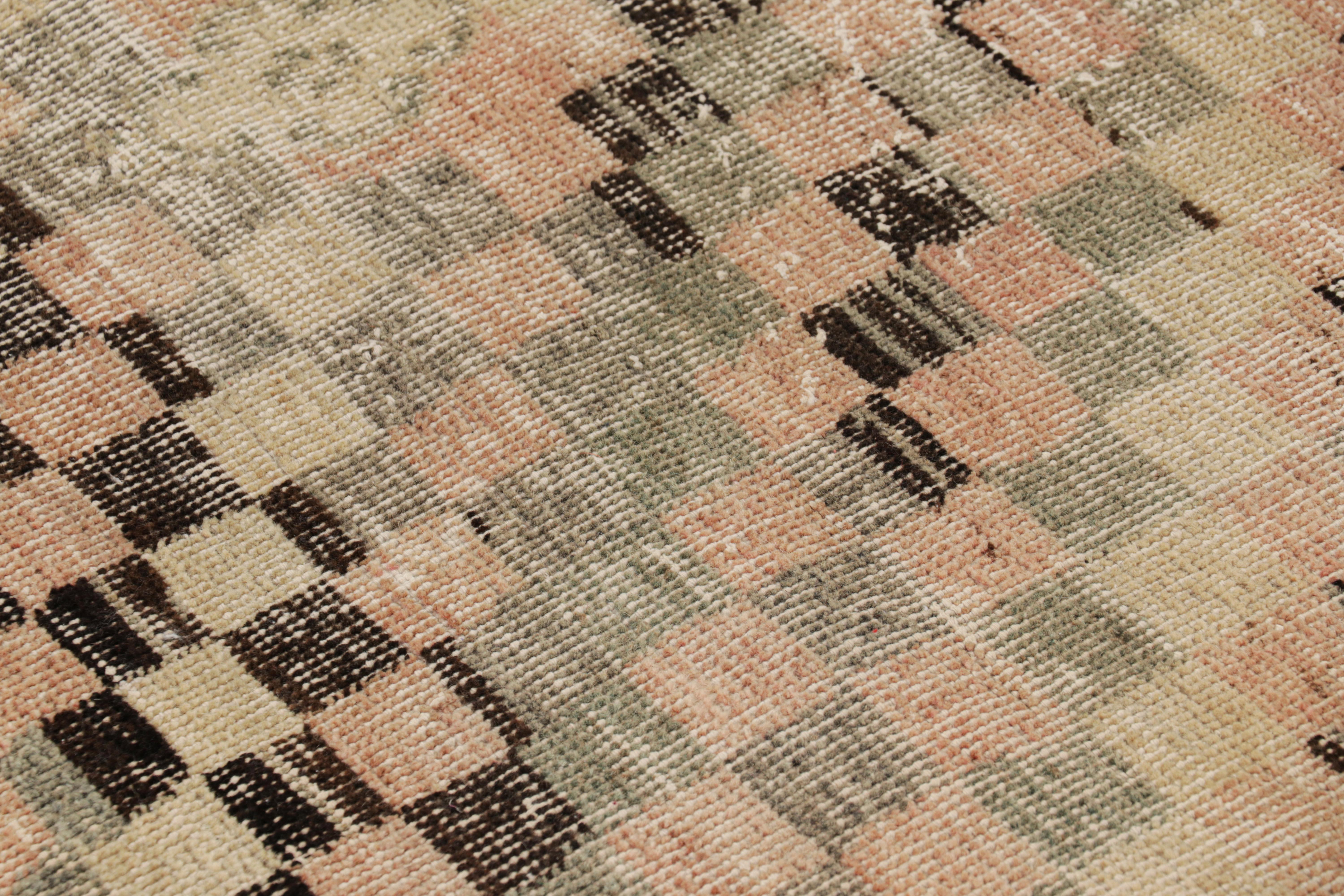 Hand-knotted in wool and originating from Turkey circa 1960 – 1970, this 2x6 vintage Zeki Müren runner is a unique addition to the Rug & Kilim Collection for its wide range of colors and geometric patterns across the field. 

On the Design: