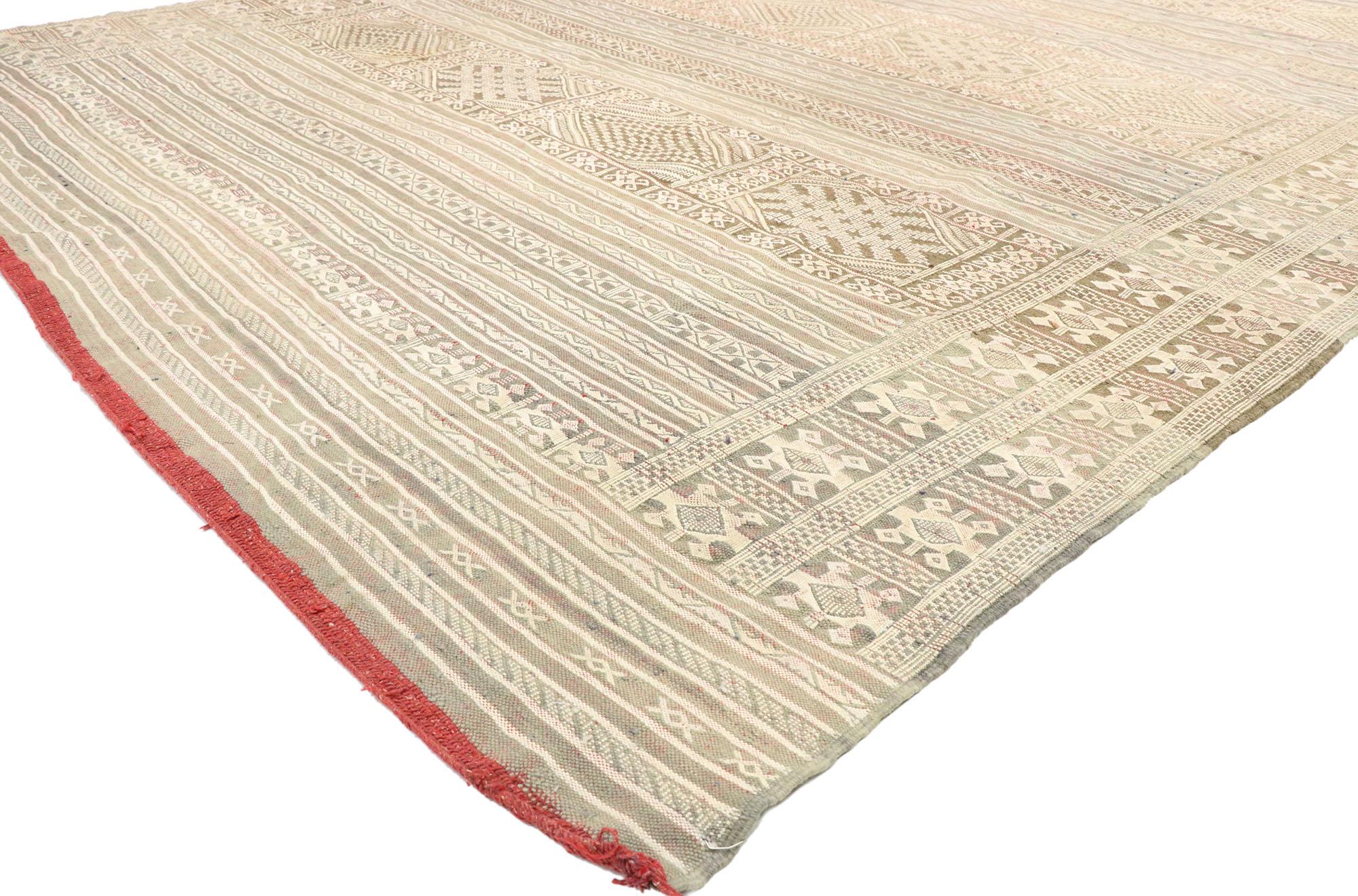 20782, vintage Moroccan Zemmour Berber Kilim area rug with Bohemian Tribal style. This handwoven wool vintage Moroccan Zemmour Berber Kilim rug features an all-over geometric pattern. It beautifully displays alternating rows of wide bands and