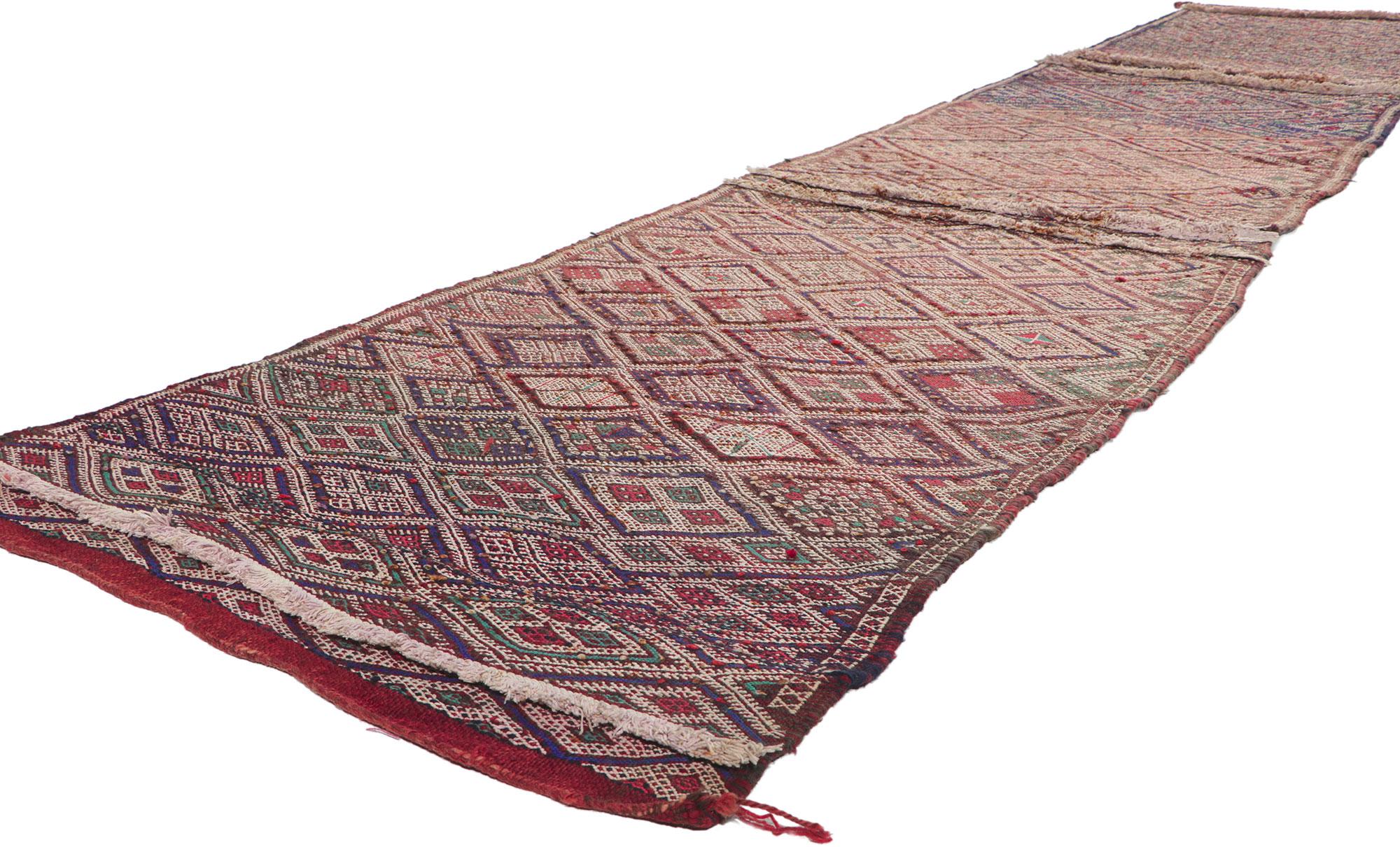 21712 Vintage Zemmour Moroccan Kilim Runner, 02'11 x 15'10. Full of tiny details and tribal style, this hand-woven wool vintage Zemmour Berber Moroccan kilim rug runner is a captivating vision of woven beauty. The abrashed field is composed of