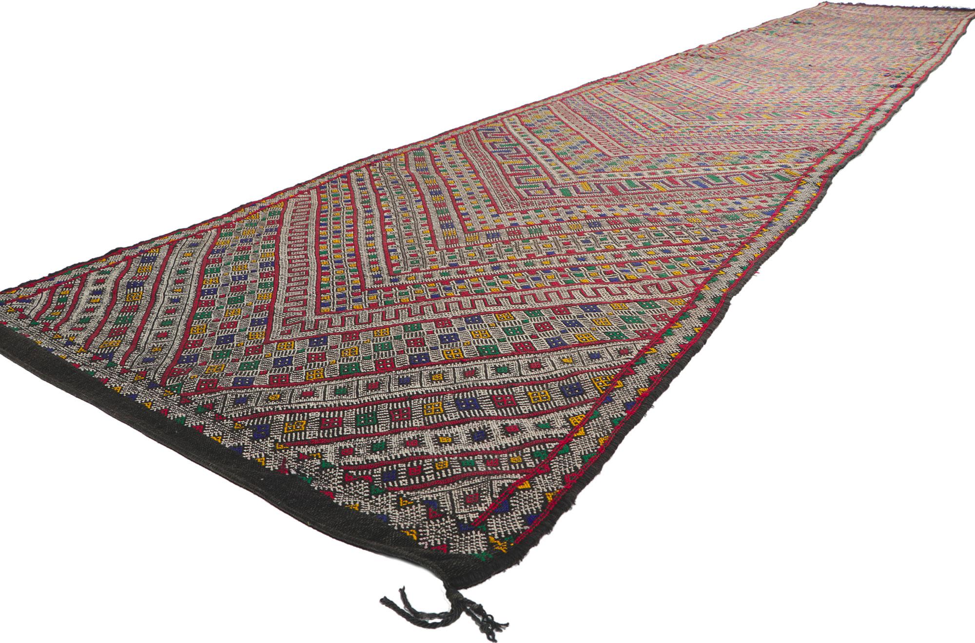 21711 Vintage Zemmour Moroccan Kilim Runner, 03'05 x 22'04. Full of tiny details and tribal style, this hand-woven wool vintage Zemmour Berber Moroccan kilim rug runner is a captivating vision of woven beauty. The abrashed field is composed of