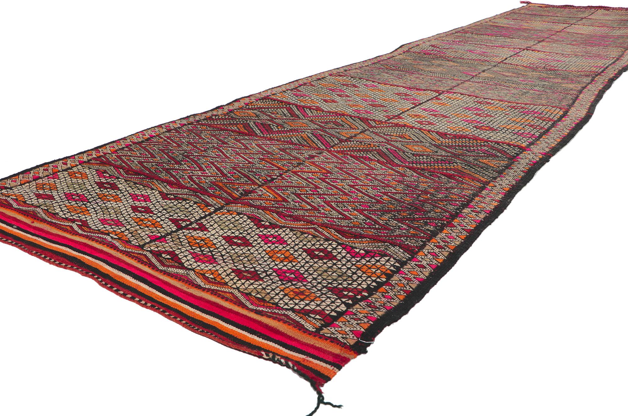 21710 Vintage Zemmour Moroccan Kilim Runner, 03'07 x 15'11. Full of tiny details and tribal style, this hand-woven wool vintage Zemmour Berber Moroccan kilim rug runner is a captivating vision of woven beauty. The abrashed field is composed of