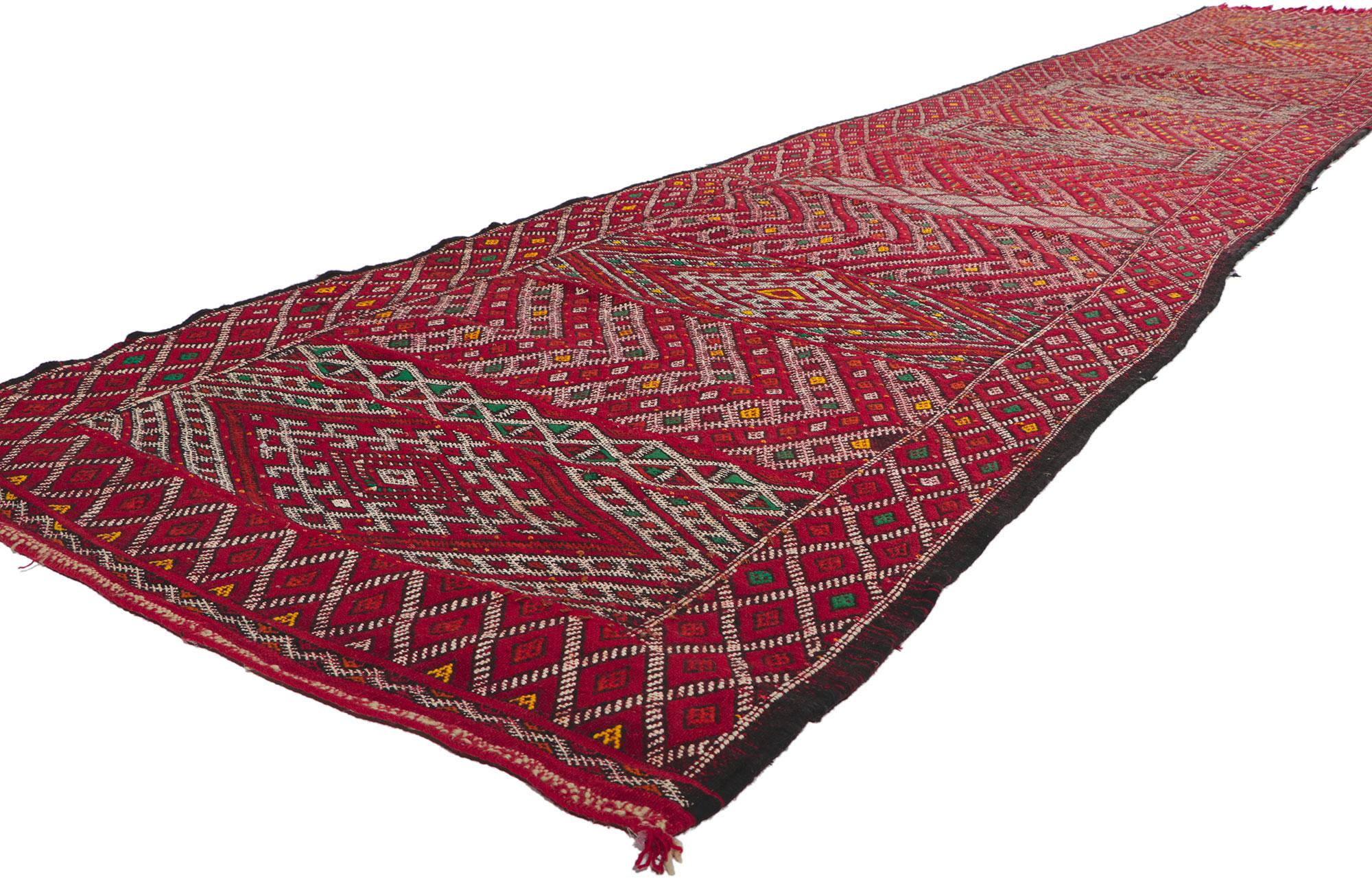 21706 Vintage Zemmour Moroccan Kilim Runner, 03'06 x 19'04. Full of tiny details and tribal style, this hand-woven wool vintage Zemmour Berber Moroccan kilim rug runner is a captivating vision of woven beauty. The abrashed field is composed of
