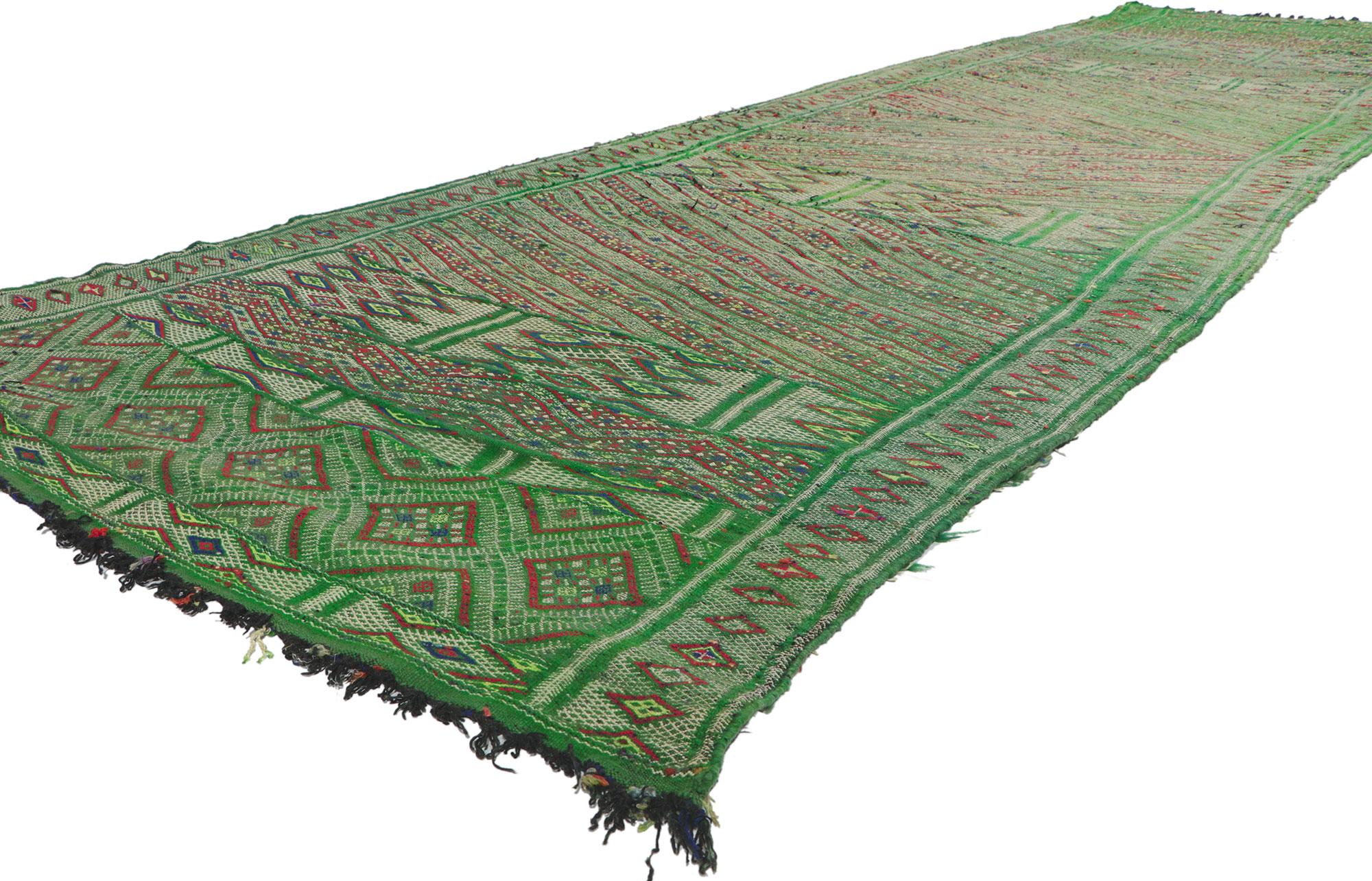 21701 Vintage Zemmour Moroccan Kilim Runner, 04'04 x 16'03. Full of tiny details and nomadic charm, this hand-woven wool vintage Zemmour Berber Moroccan kilim rug runner is a captivating vision of woven beauty. The abrashed field features an allover